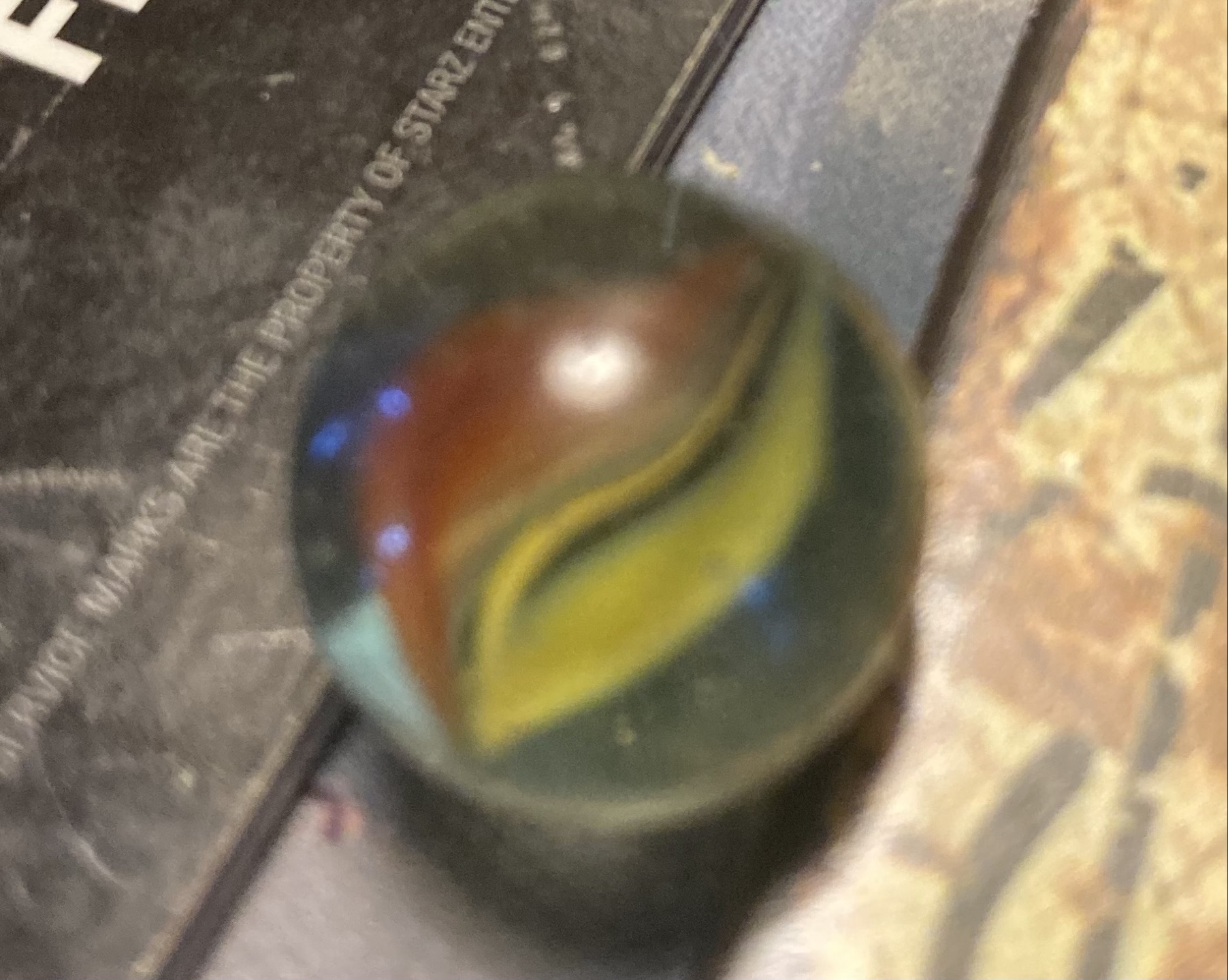 Special - Red, Blue and Yellow Striped Transparent by Akro Agate, identification view