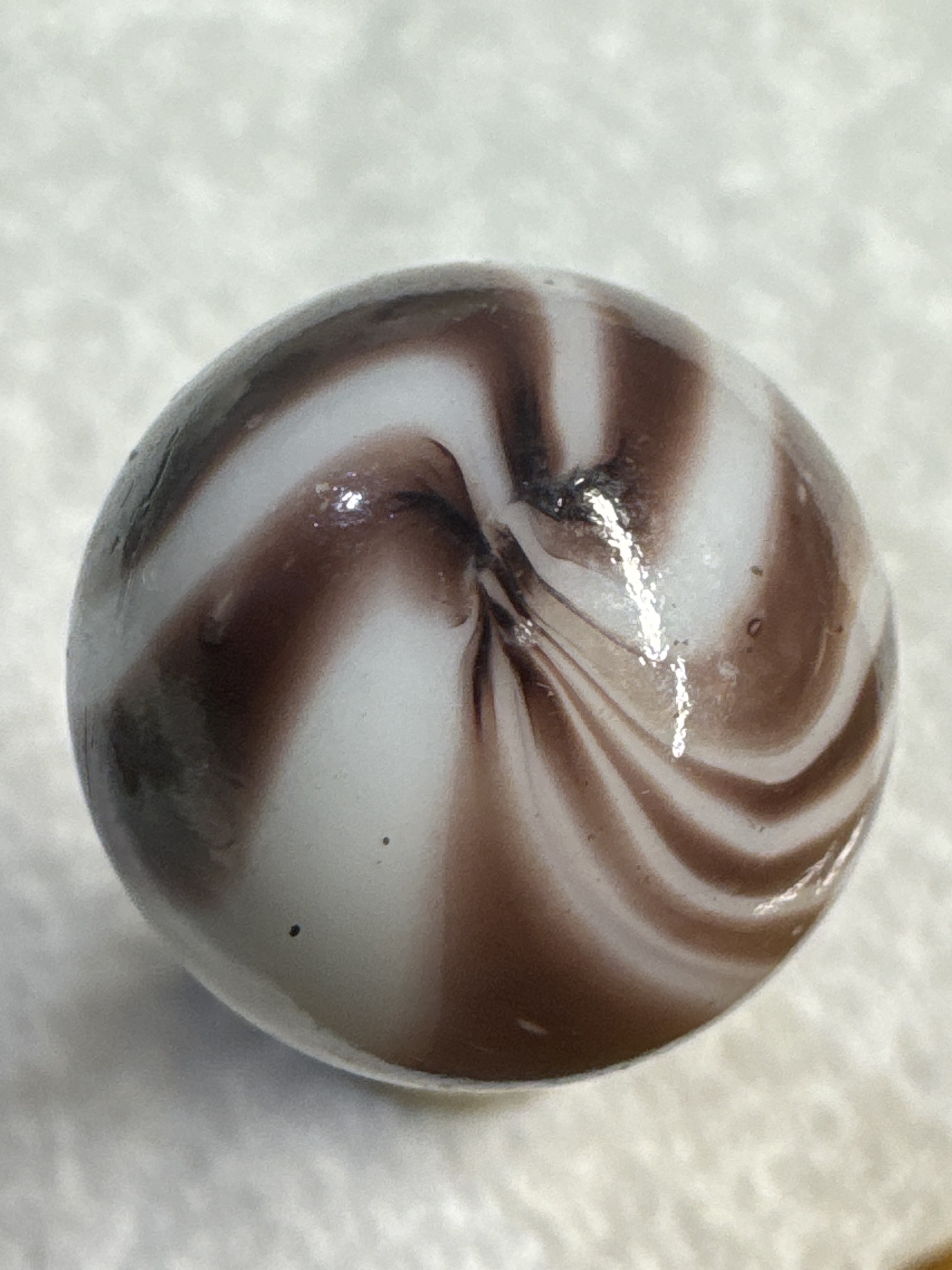 Oxblood Swirl by Akro Agate Company, identification view