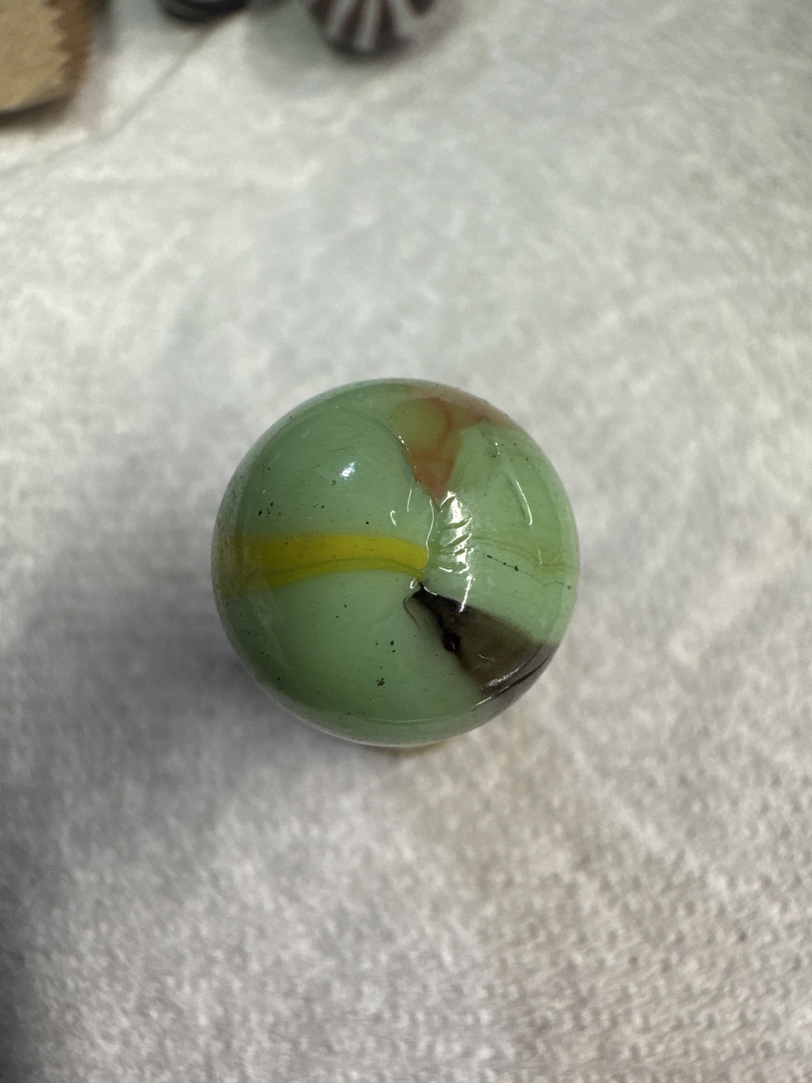 Limeade Egg Yolk Corkscrew by Akro Agate, identification view