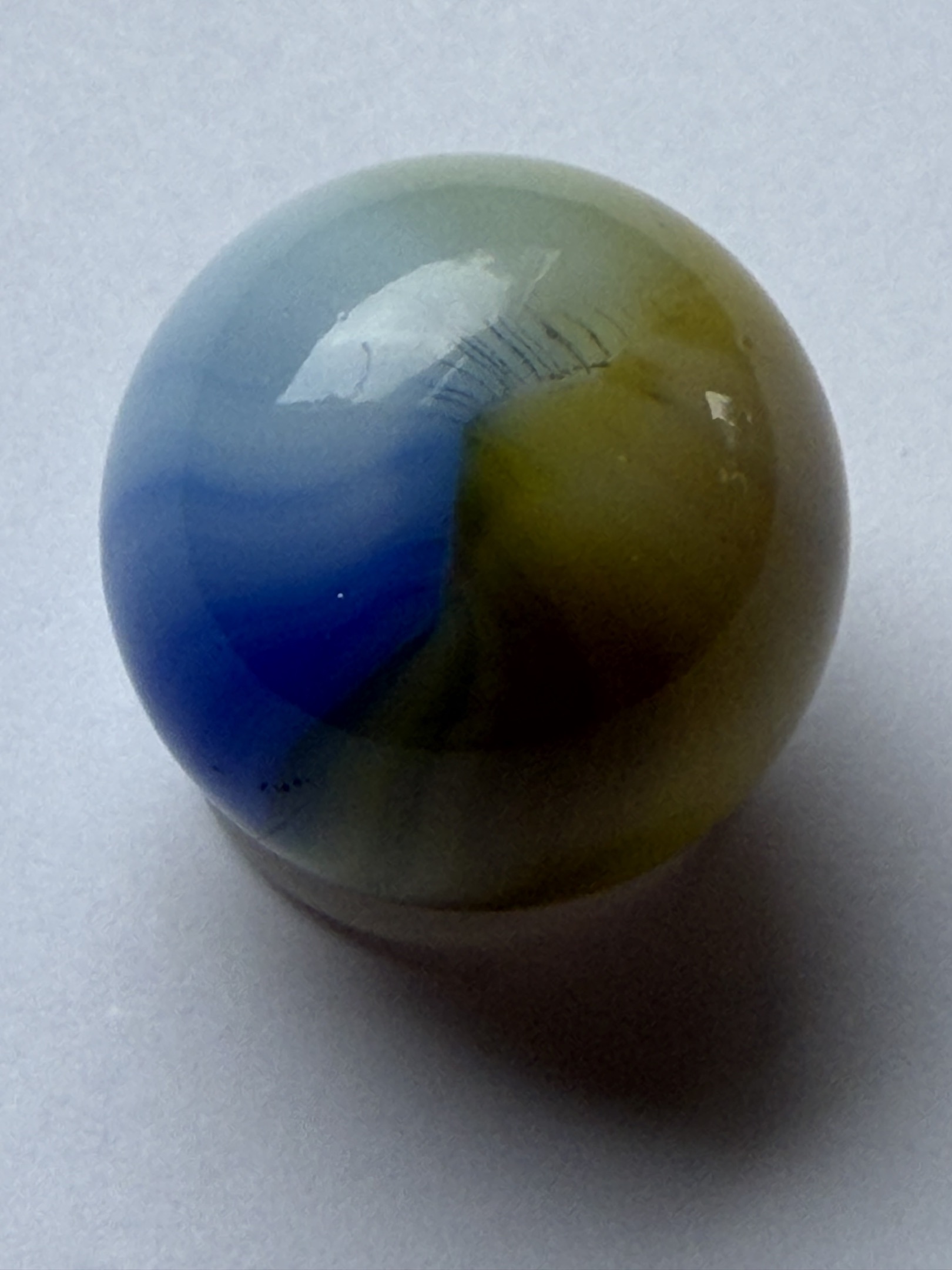 Blue and Yellow-Green Rainbo by Peltier Glass Company