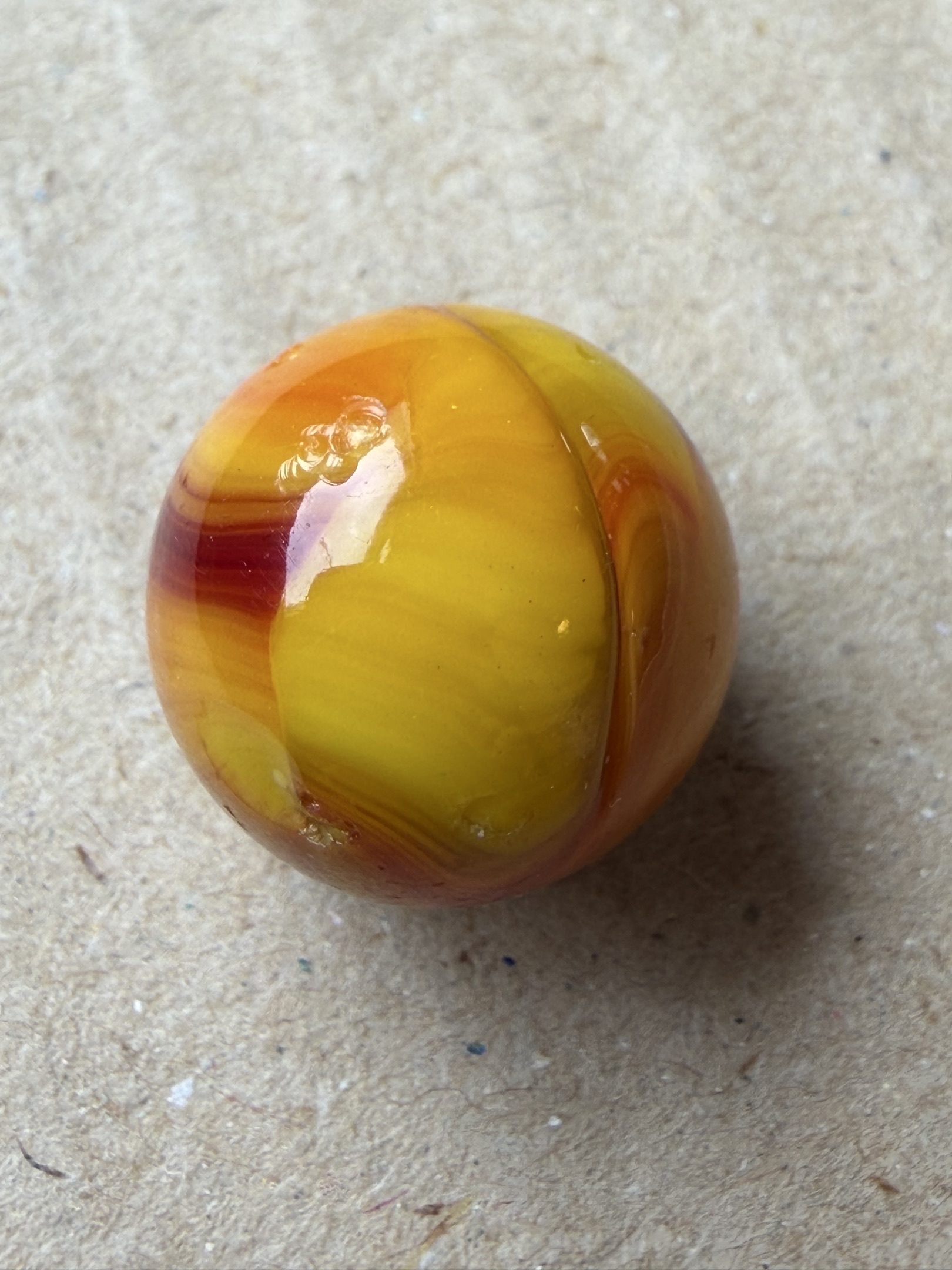 Yellow and Orange Swirl with Oxblood by Christensen Agate Company