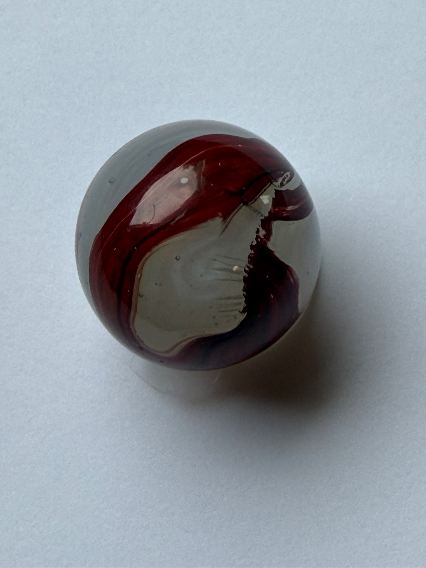 Silver Oxblood by Akro Agate
