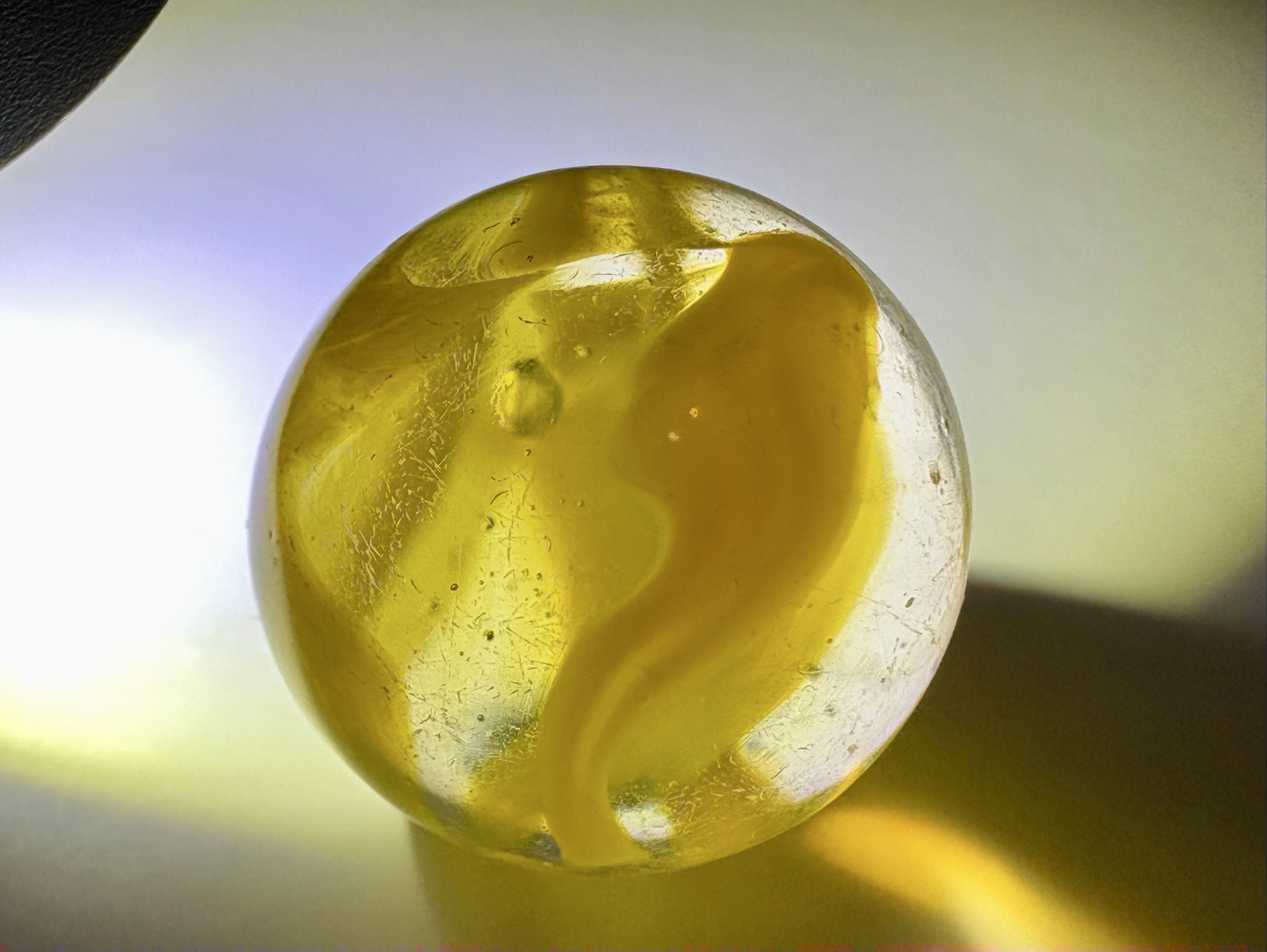 Yellow Ribbon Cat's Eye (Shooter) by Vitro Agate Company, identification view