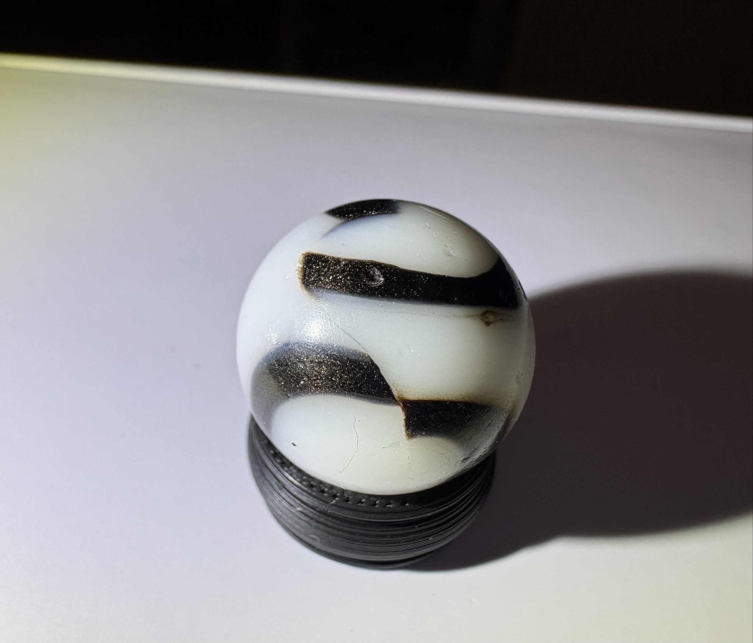 Black Aventurine Swirl by Peltier Glass Company, identification view