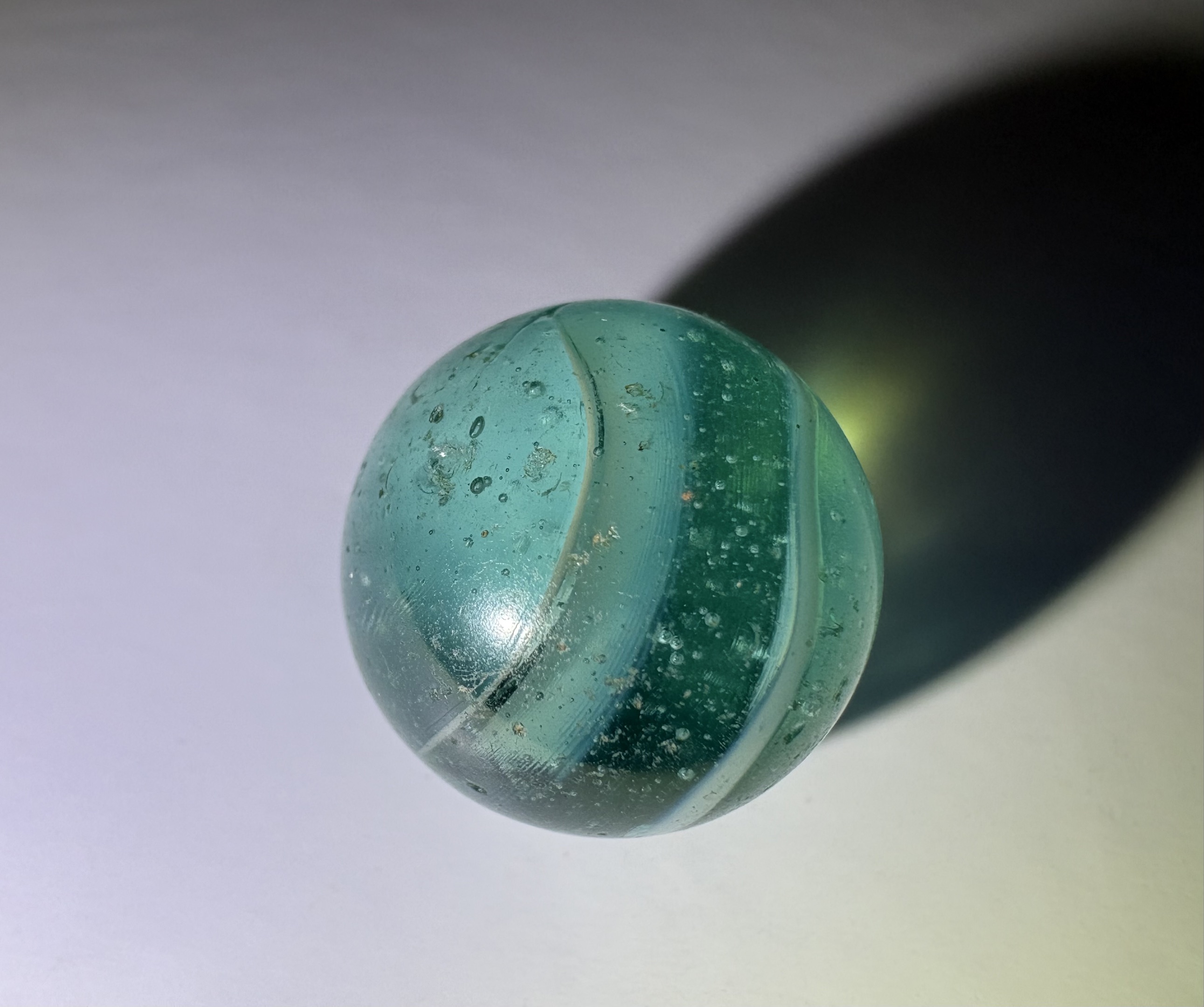 Transparent Aqua Swirl by Peltier Glass Company, identification view