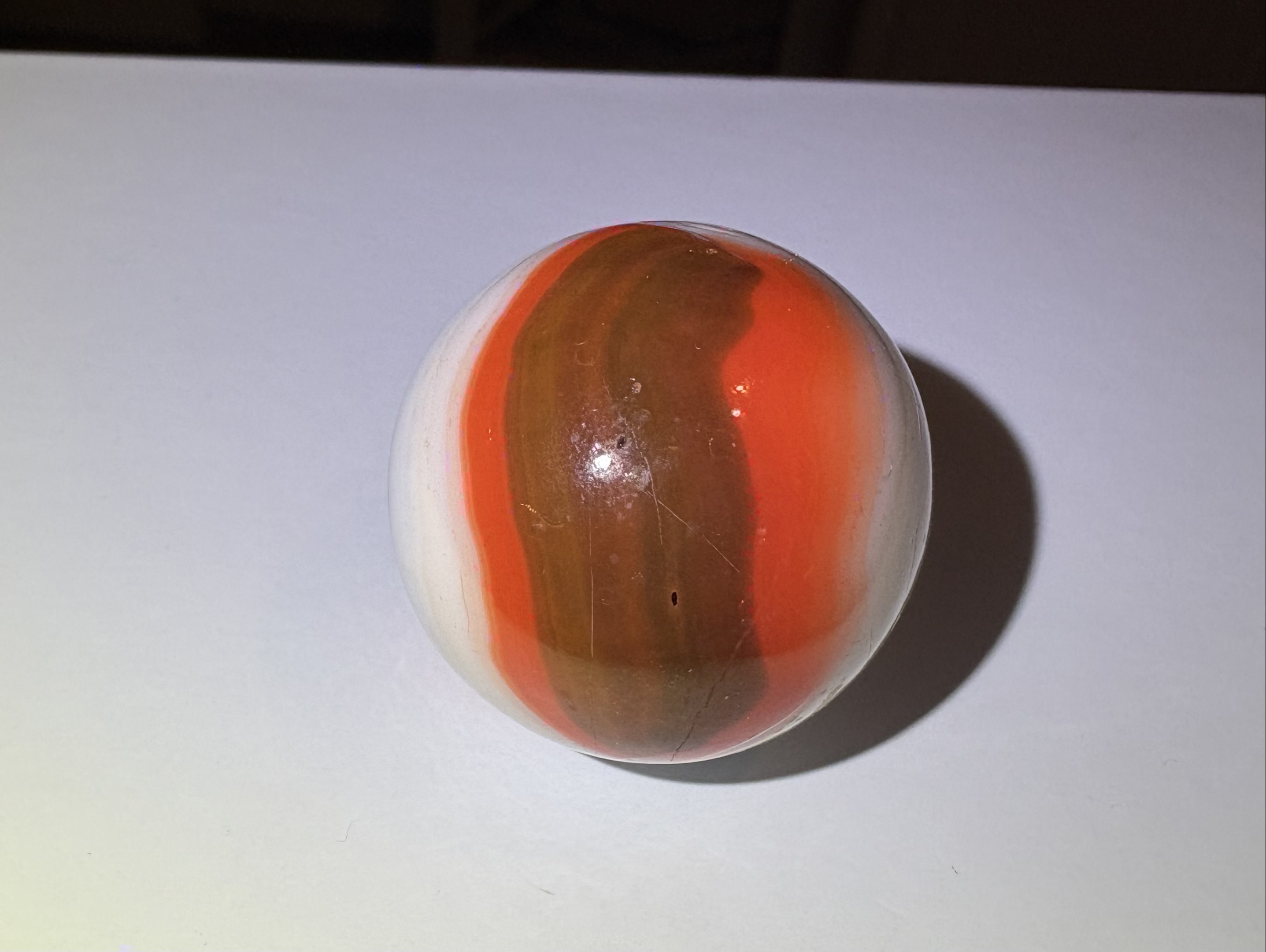 Halloween Swirl (Boulder) by Akro Agate Company, identification view