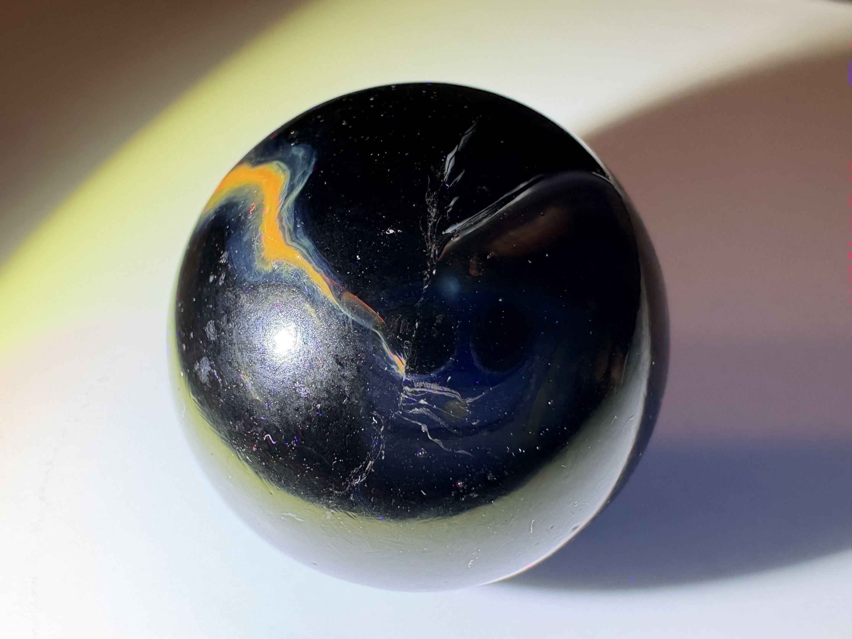Black Line Swirl Shooter by Vitro Agate Company, identification view