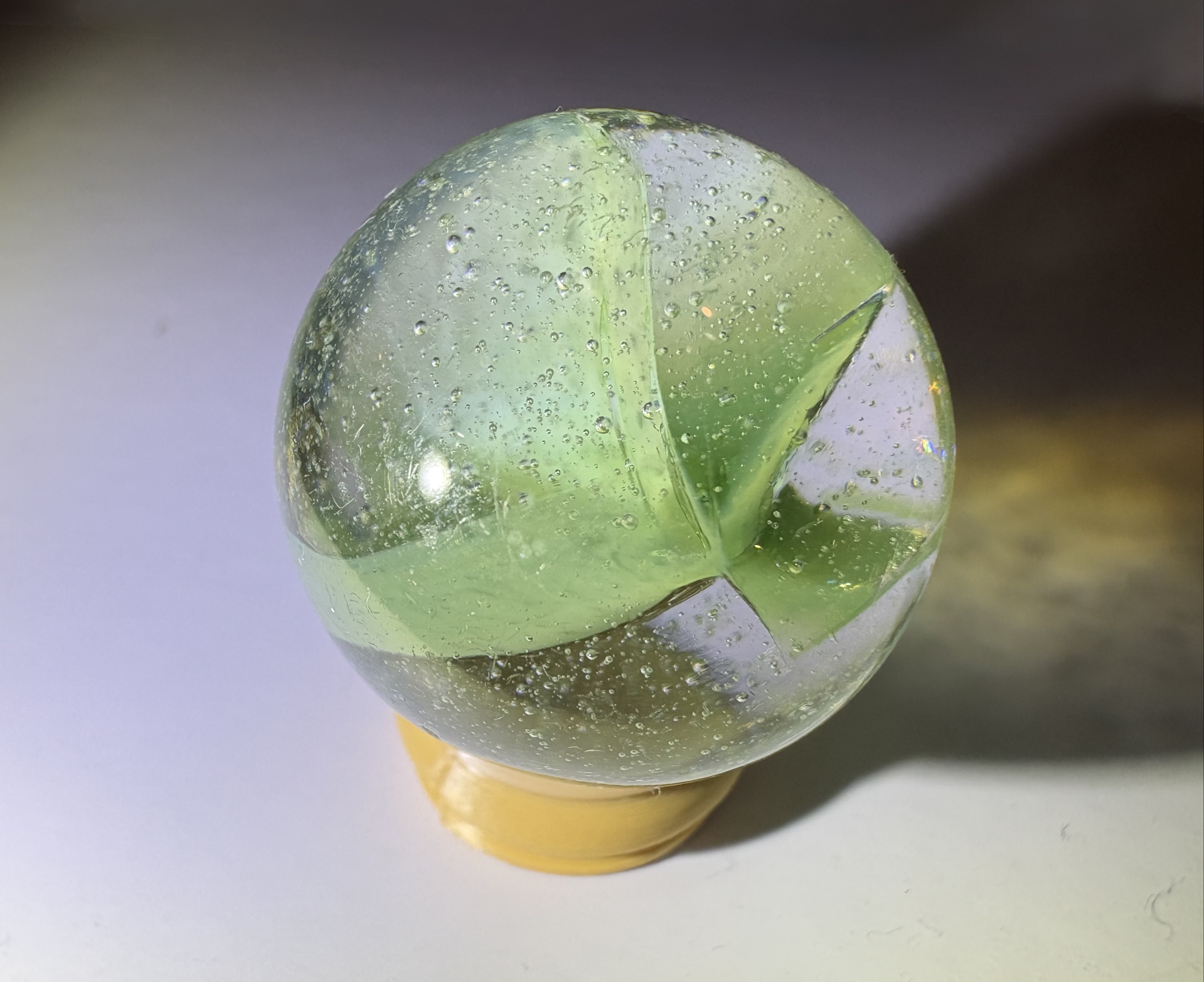 4-Vane Green Cat's Eye Shooter by Vitro Agate Company, identification view