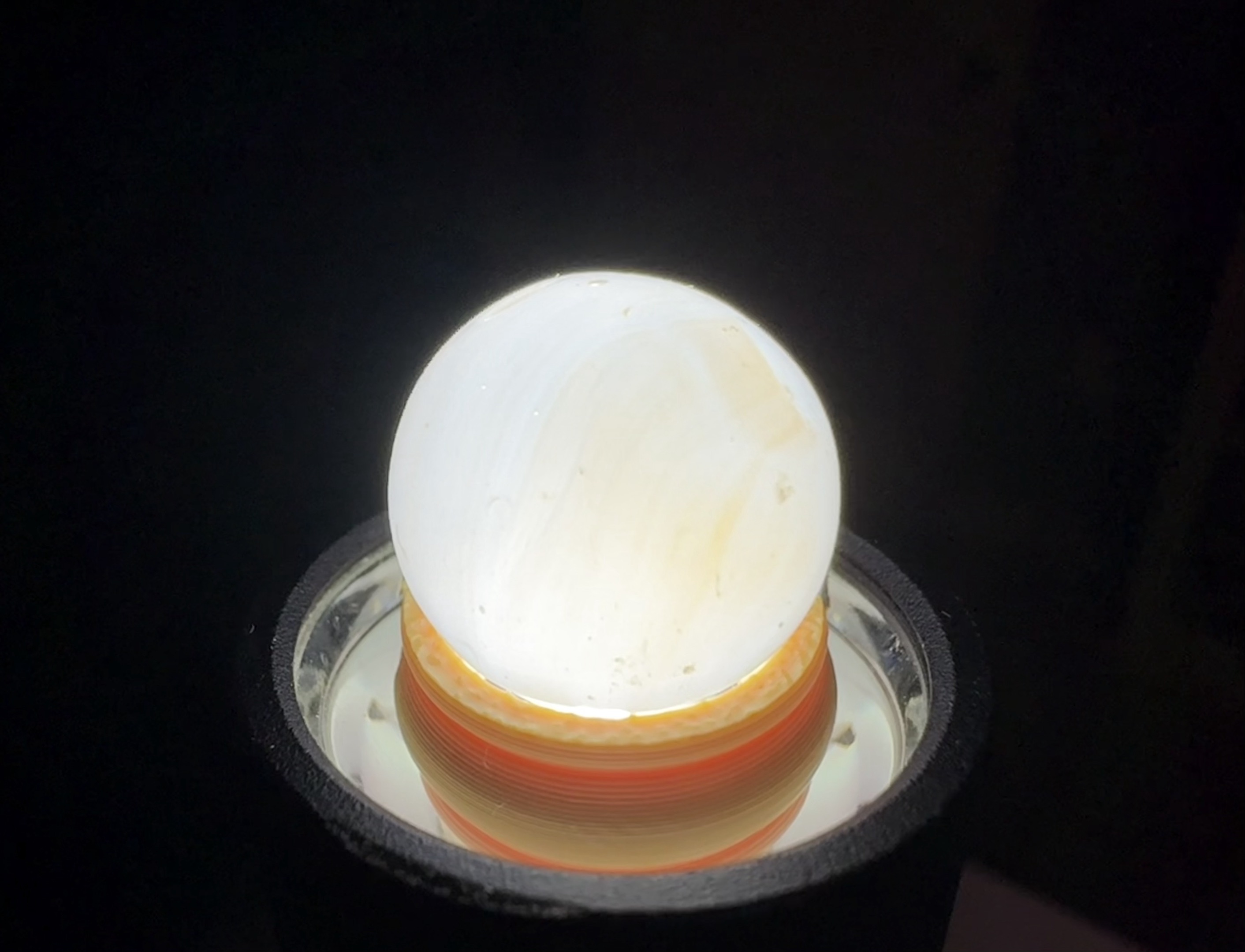 Amber Swirl Moonie by Akro Agate Company, identification view