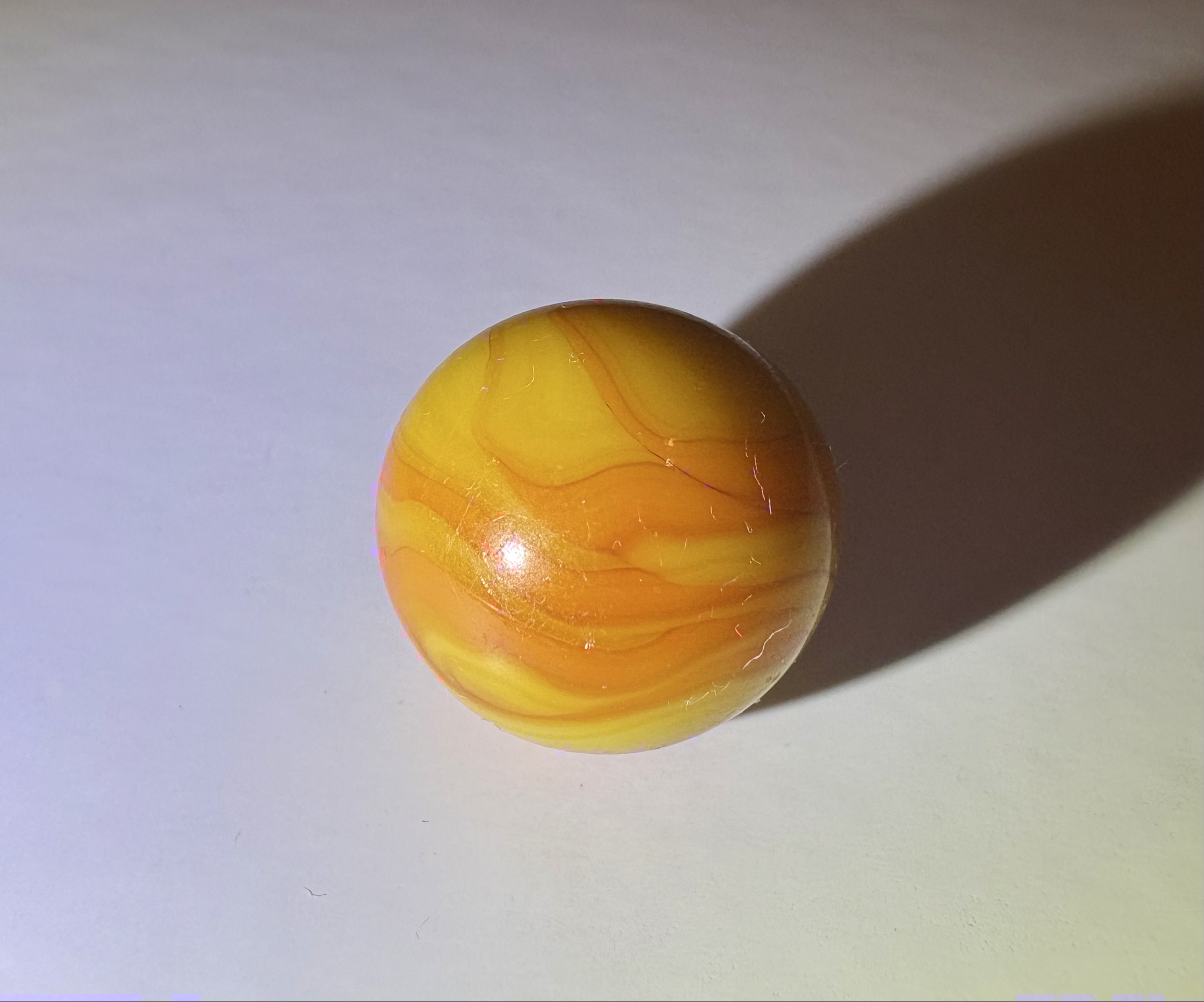 Christensen Agate Yellow and Orange Swirl by Christensen Agate Company, identification view