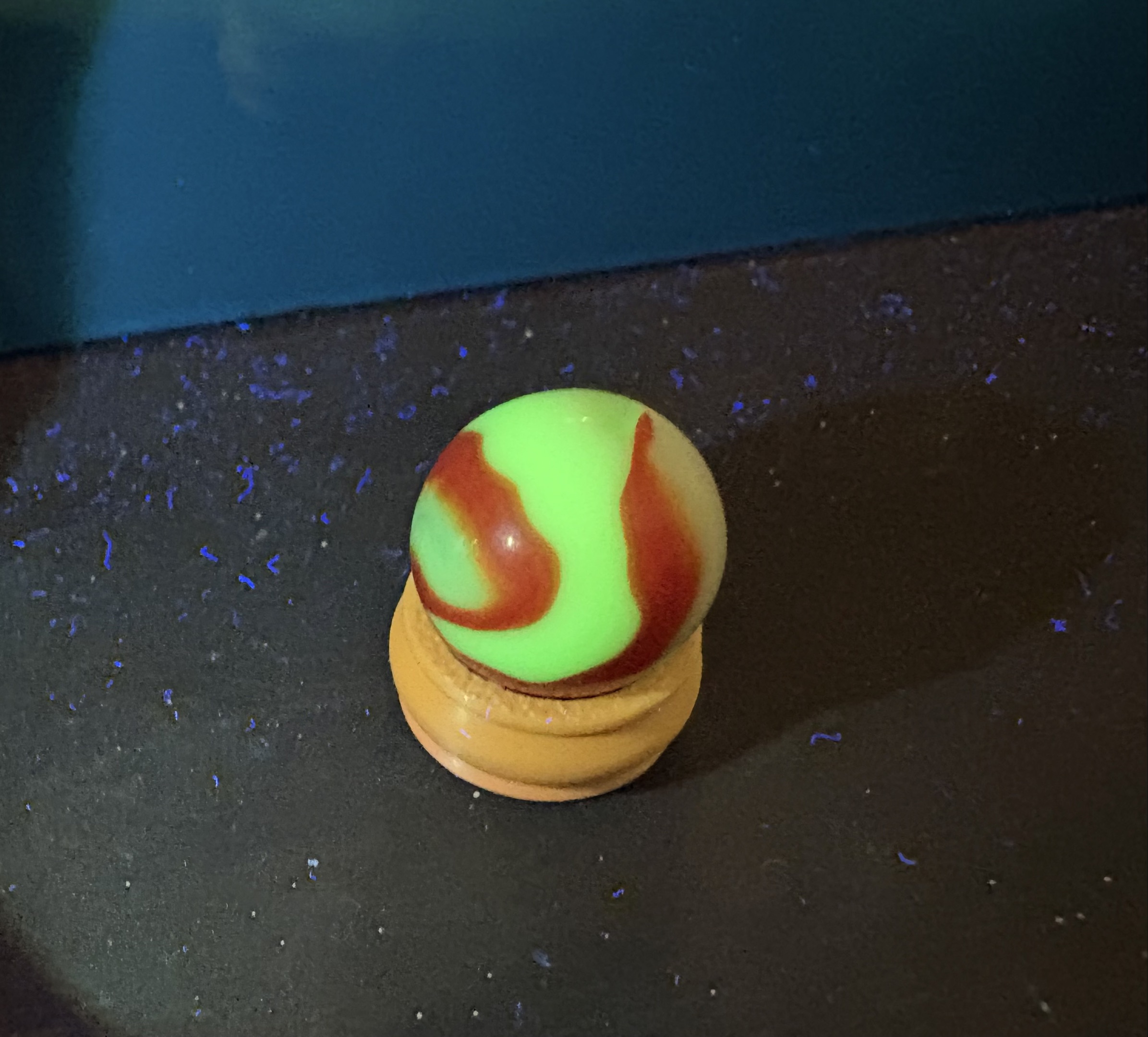 Fluorescent Red Swirl by Akro Agate Company, identification view