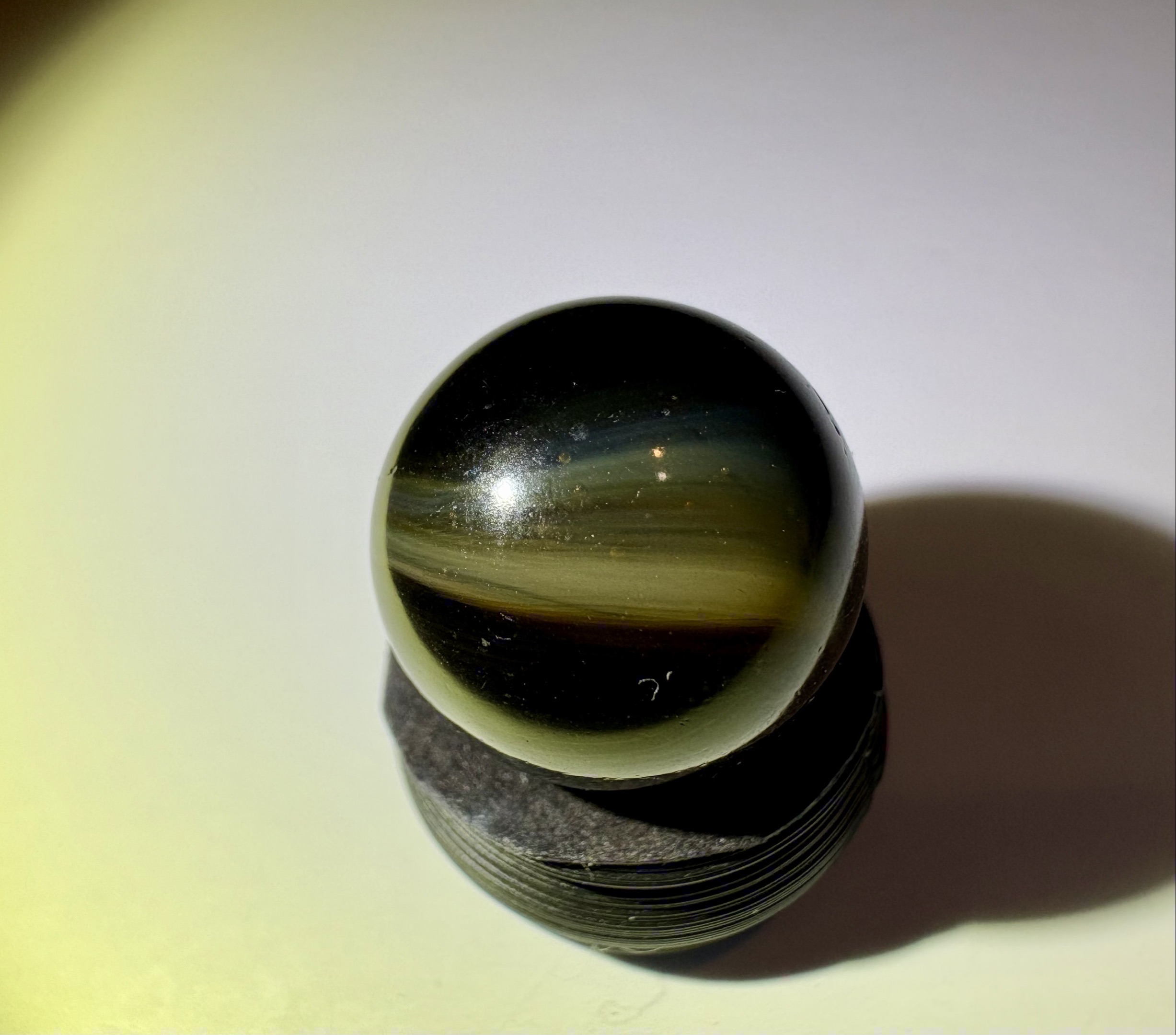 Black/Amber Slag by Akro Agate Company, identification view