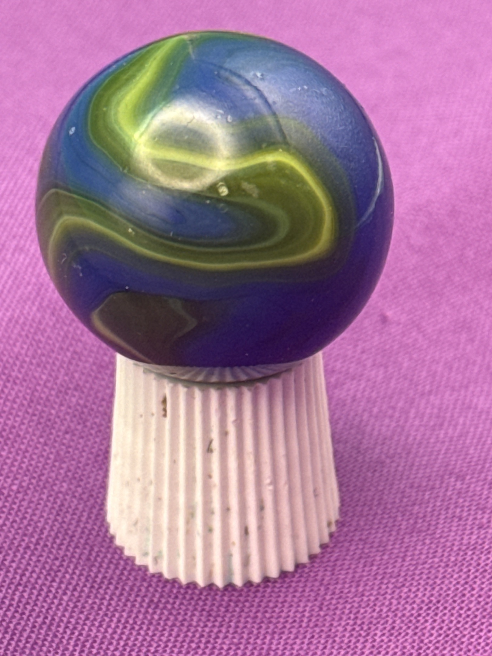 Blue Opaque Corkscrew with Chartreuse Lime Swirl by Akro Agate, identification view