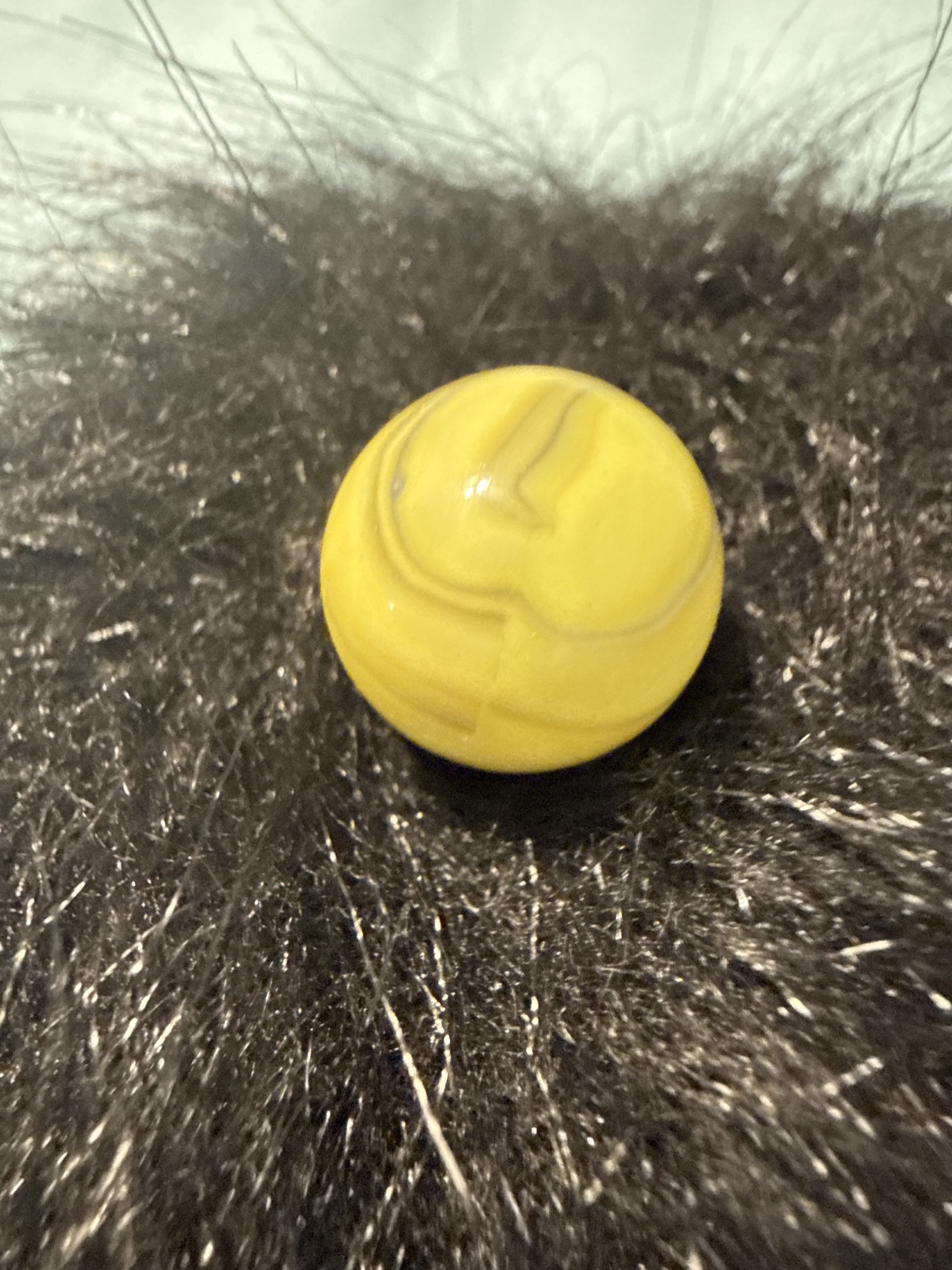 Egg Yolk Opaque Swirl by Akro Agate, identification view