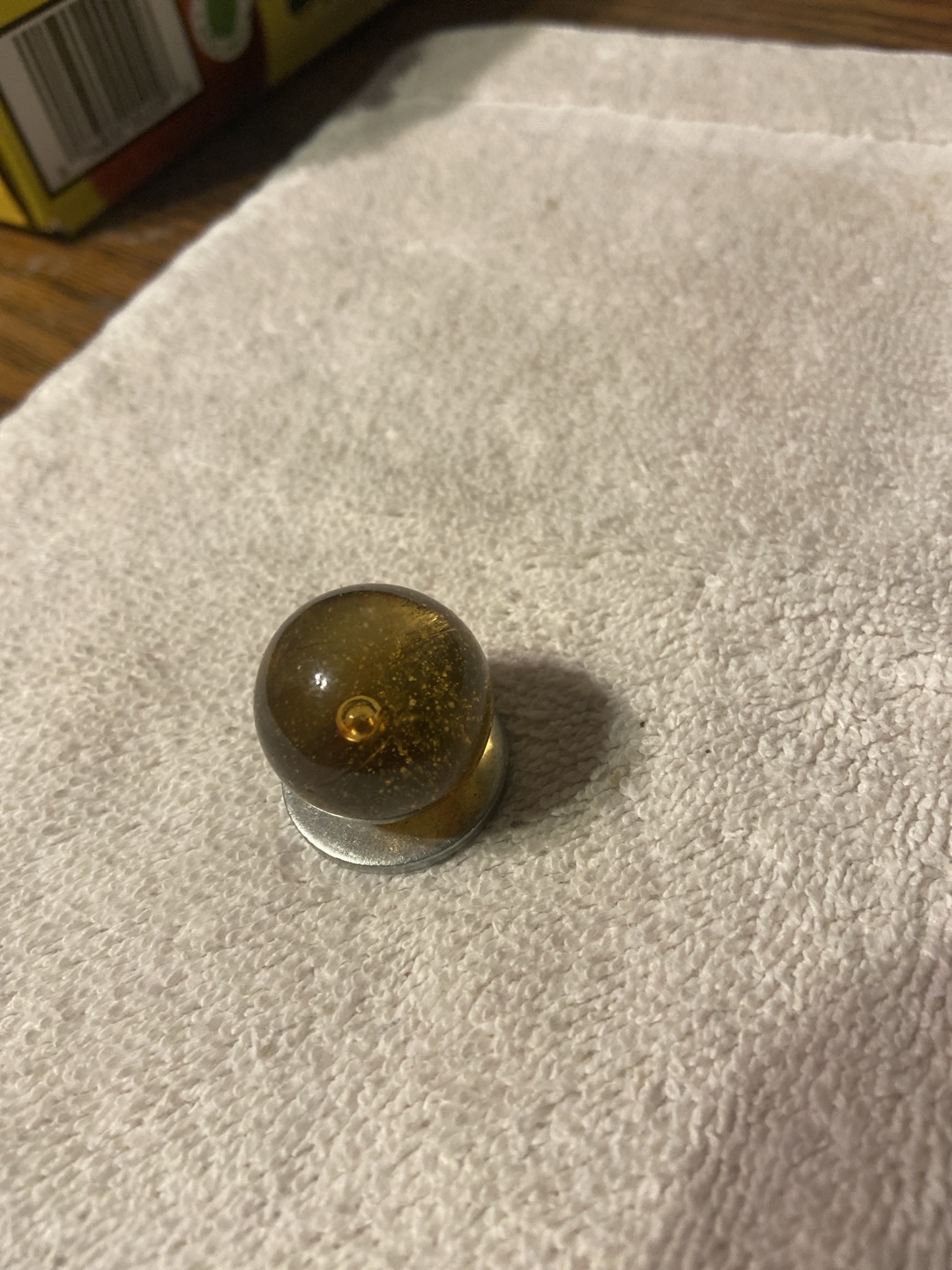 Amber Seeded Clearie by Akro Agate Company, identification view