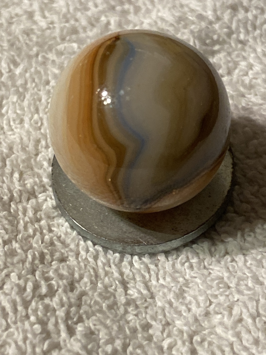 Earth Swirl (with Blue) by Akro Agate Company