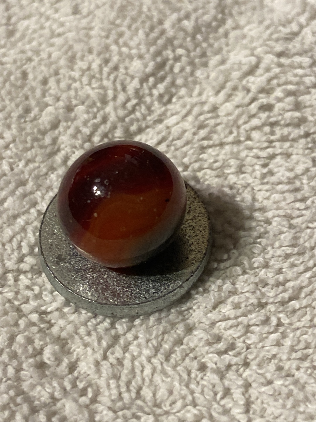 Oxblood Swirl by Akro Agate Company, identification view