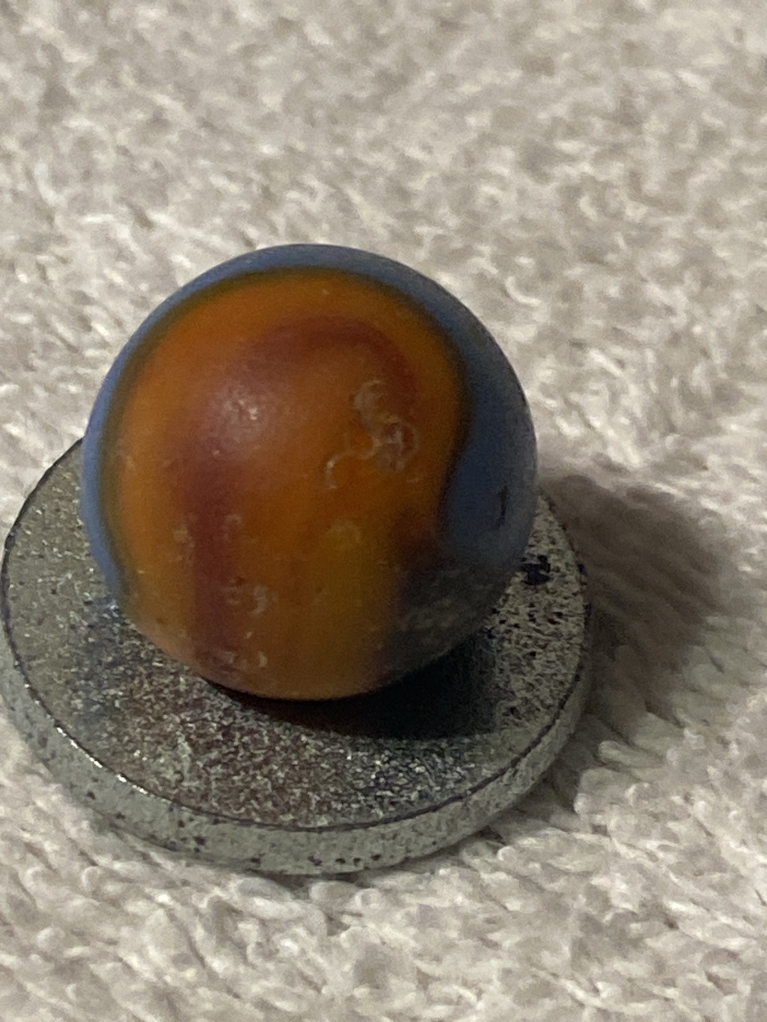 Tri-Color Swirl (Blue, Orange, Black) by Akro Agate Company