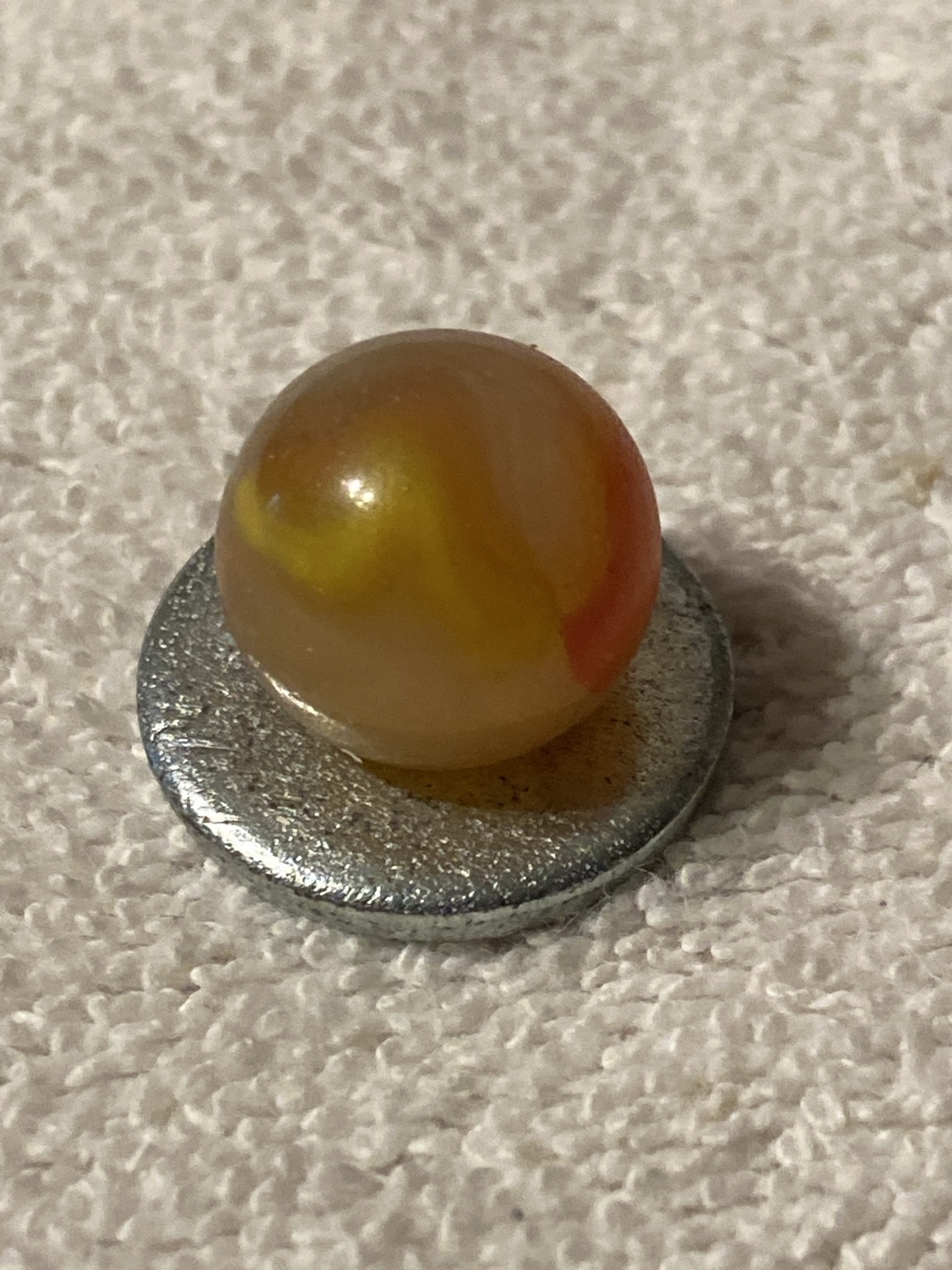 Prize Name (Amber Base) by Akro Agate Company