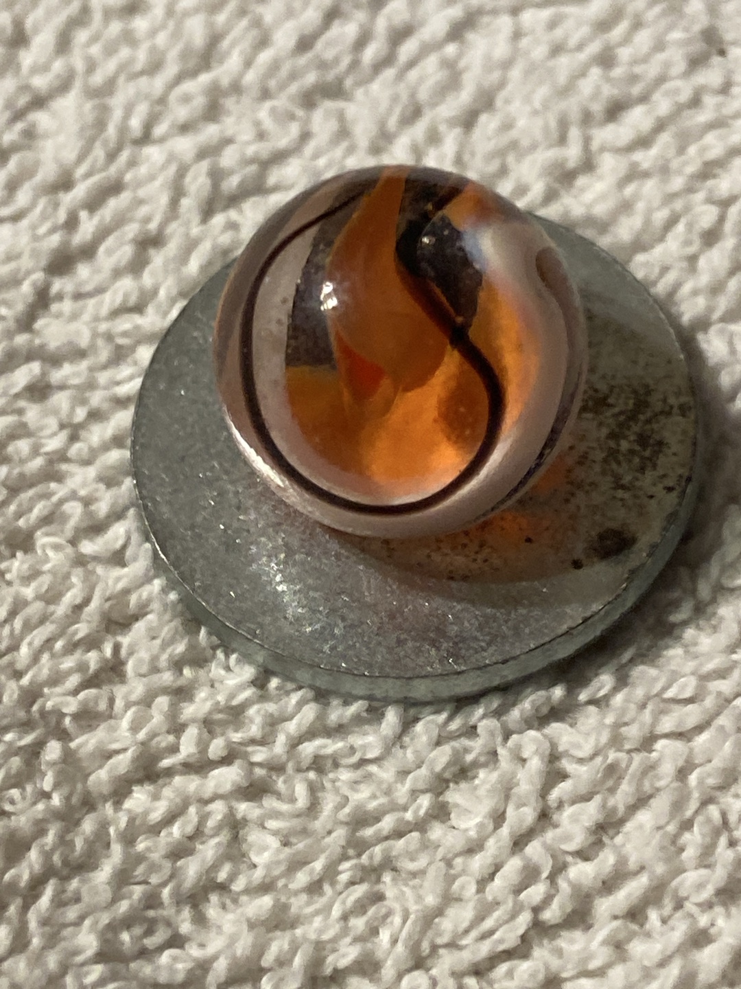 Popeye (Orange & Black) by Akro Agate Company