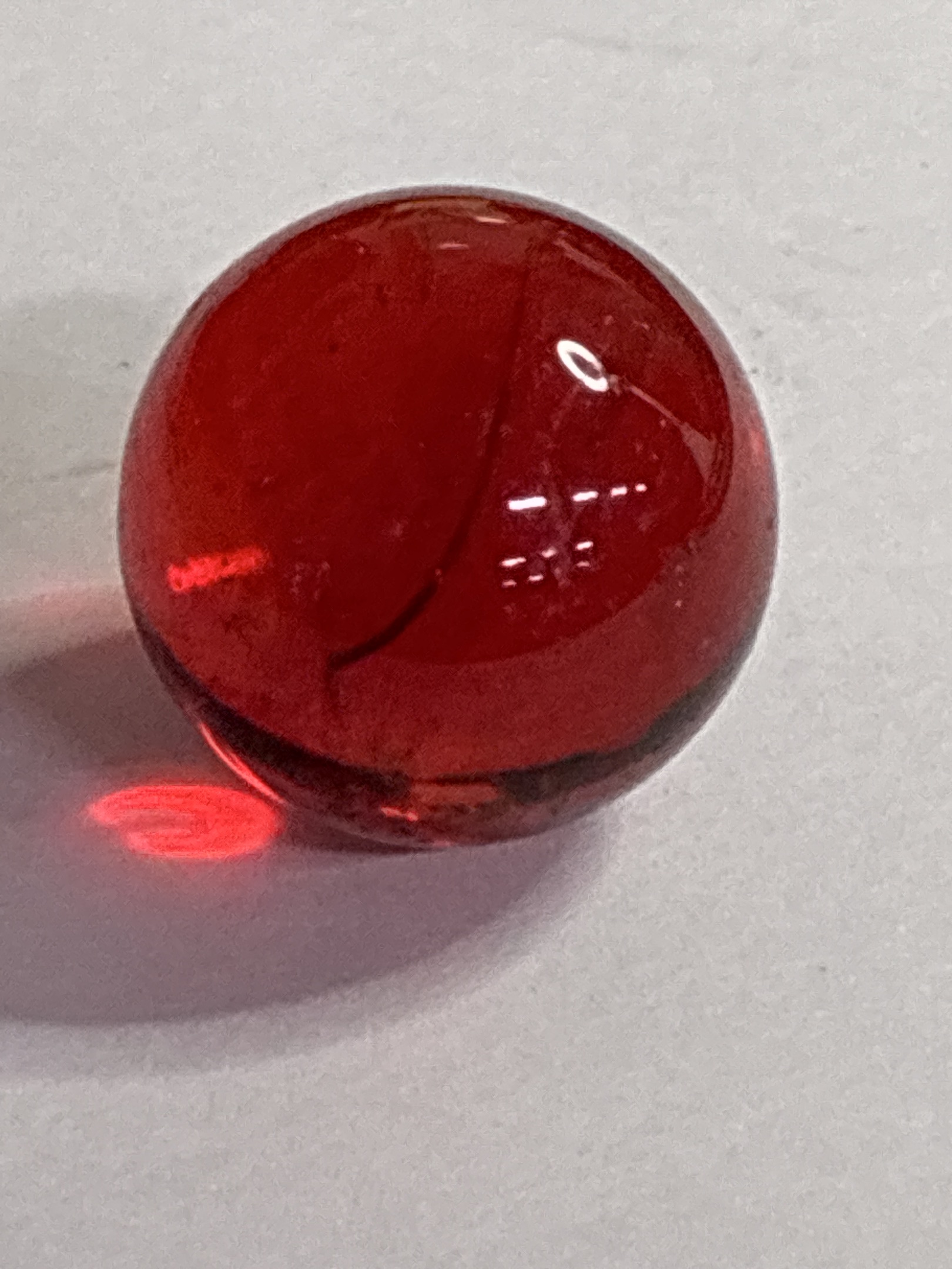 Ruby Red Clearie by Akro Agate, identification view