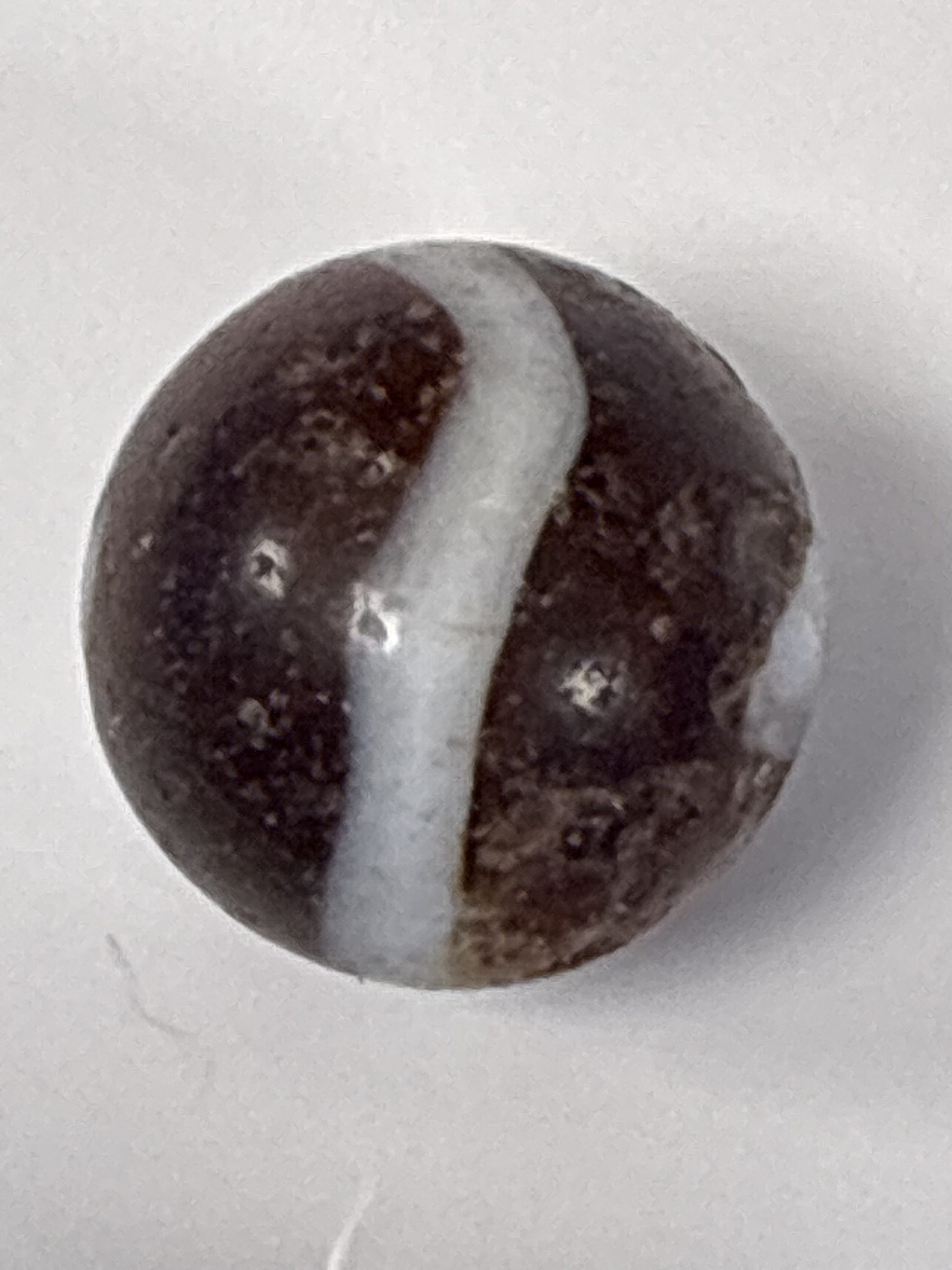 Brown and White Prize Name Swirl by Akro Agate, identification view