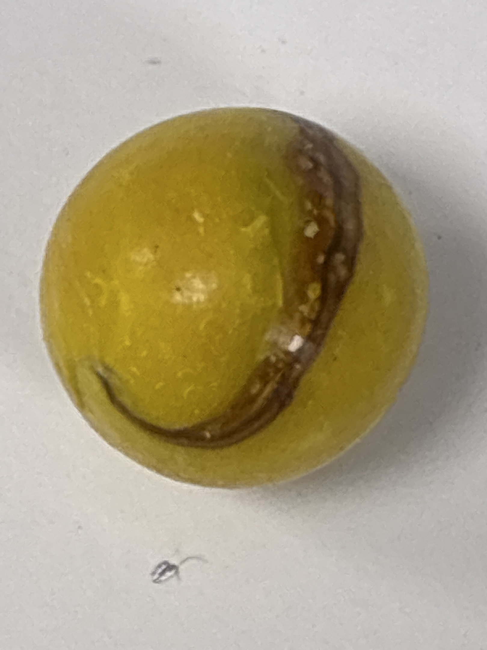 Amber and Brown Corkscrew by Akro Agate Company, identification view