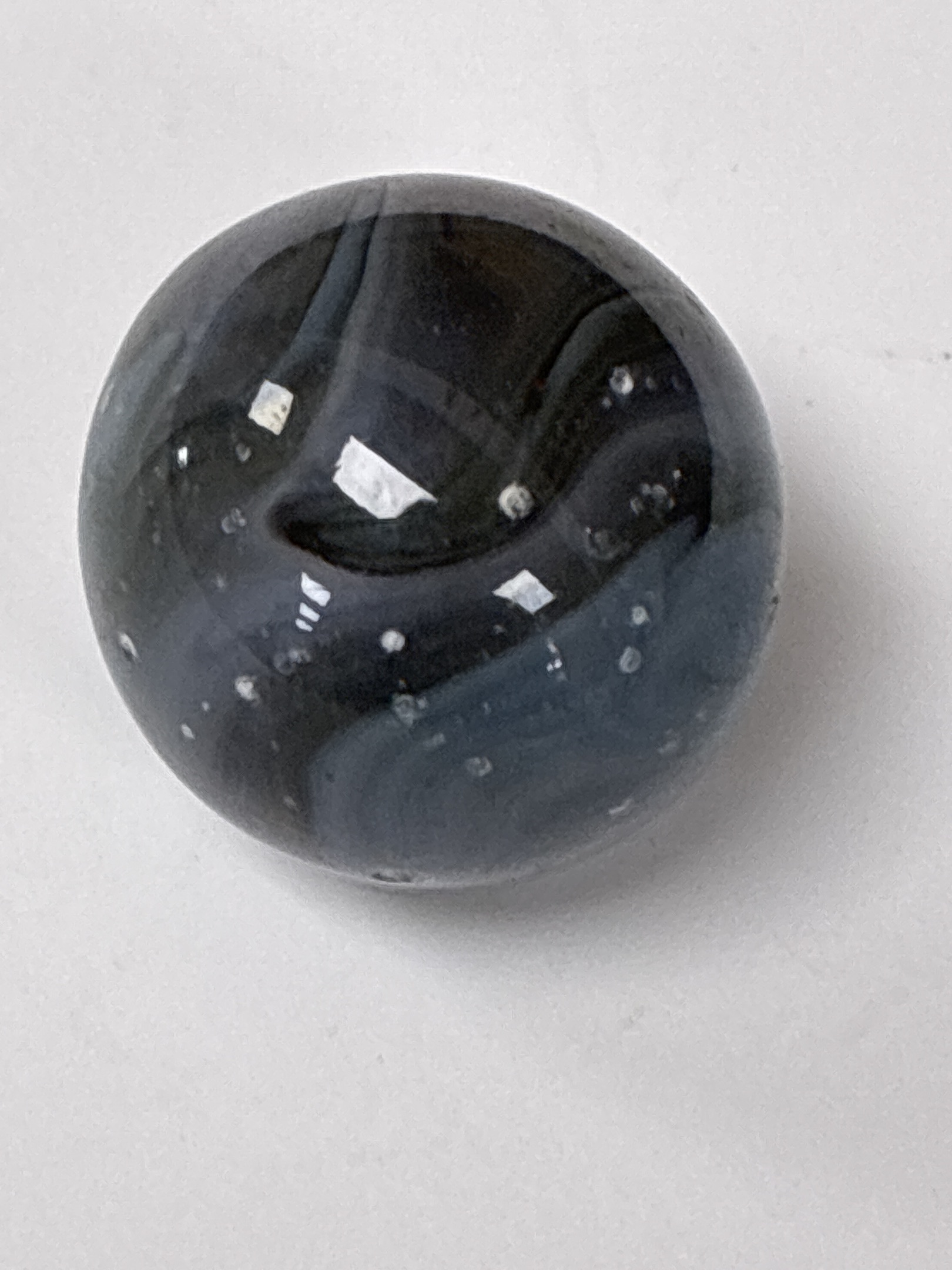 Slag (Black/Dark Amethyst/Blue) by Christensen Agate Company, identification view