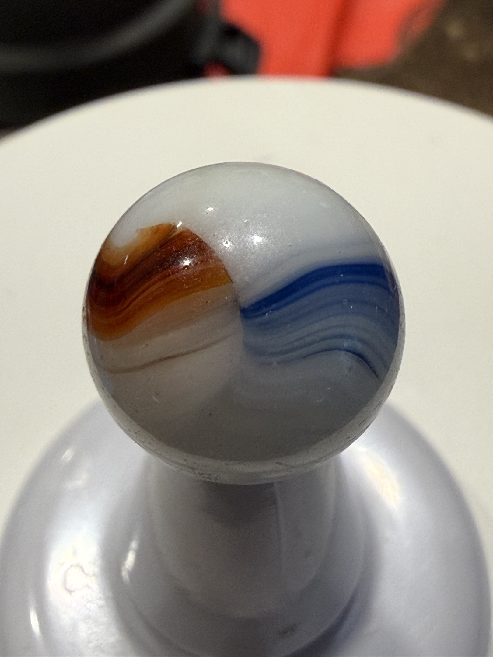 Blue and Orange/Amber Popeye by Akro Agate Company