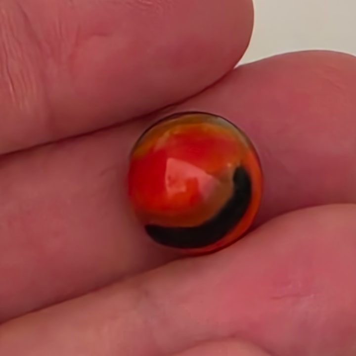 Tiger Eye - Black Line Red Orange by Vitro Agate Company, identification view