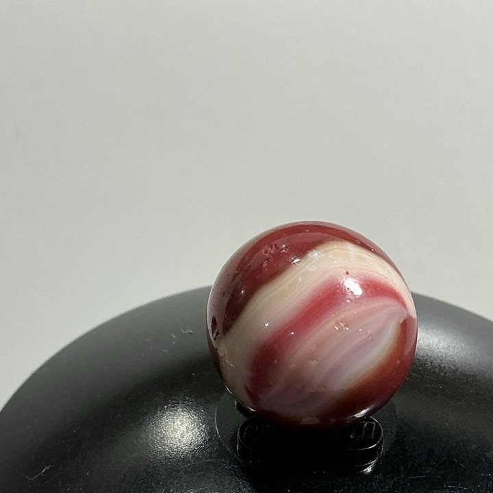 Red Oxblood Corkscrew by Akro Agate, identification view