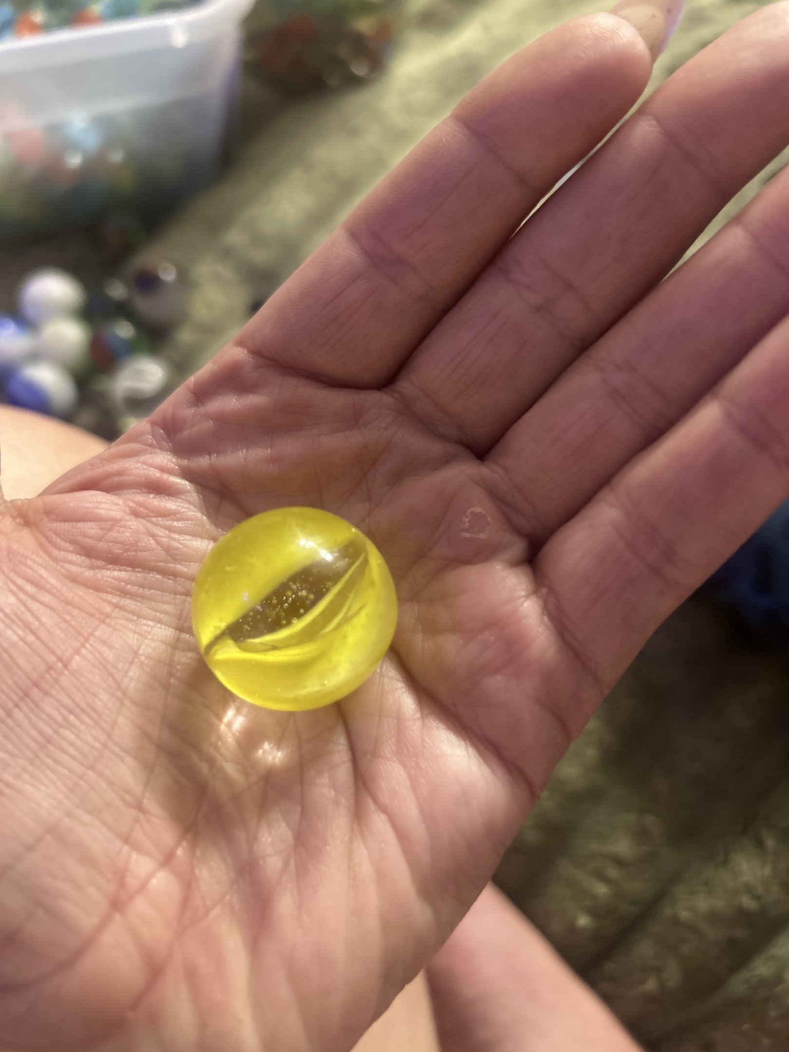 Yellow Cat's Eye Shooter by Imperial Toy / Mega Marble (China), identification view