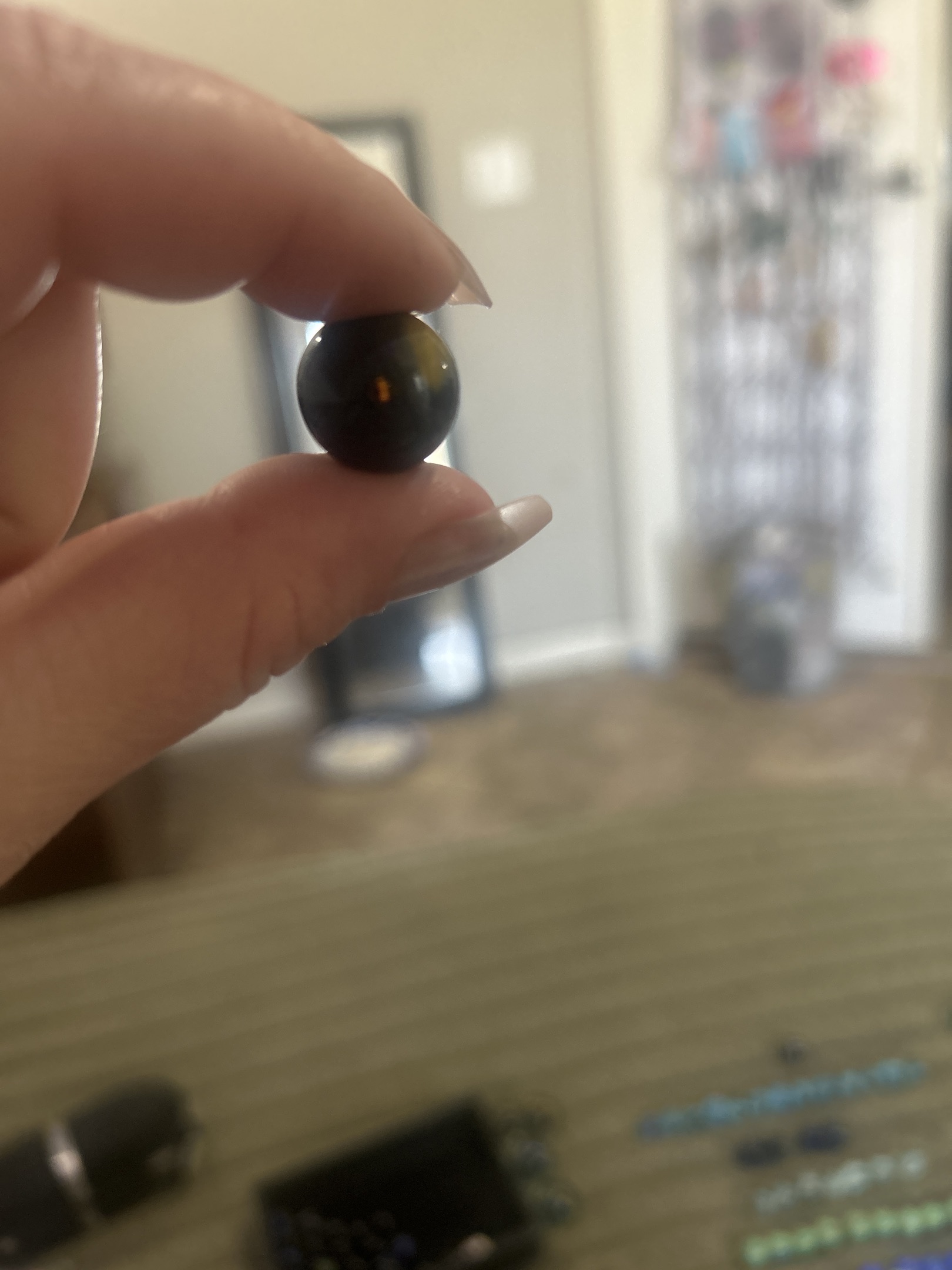 Black Bumblebee Cat's Eye by Vitro Agate, identification view