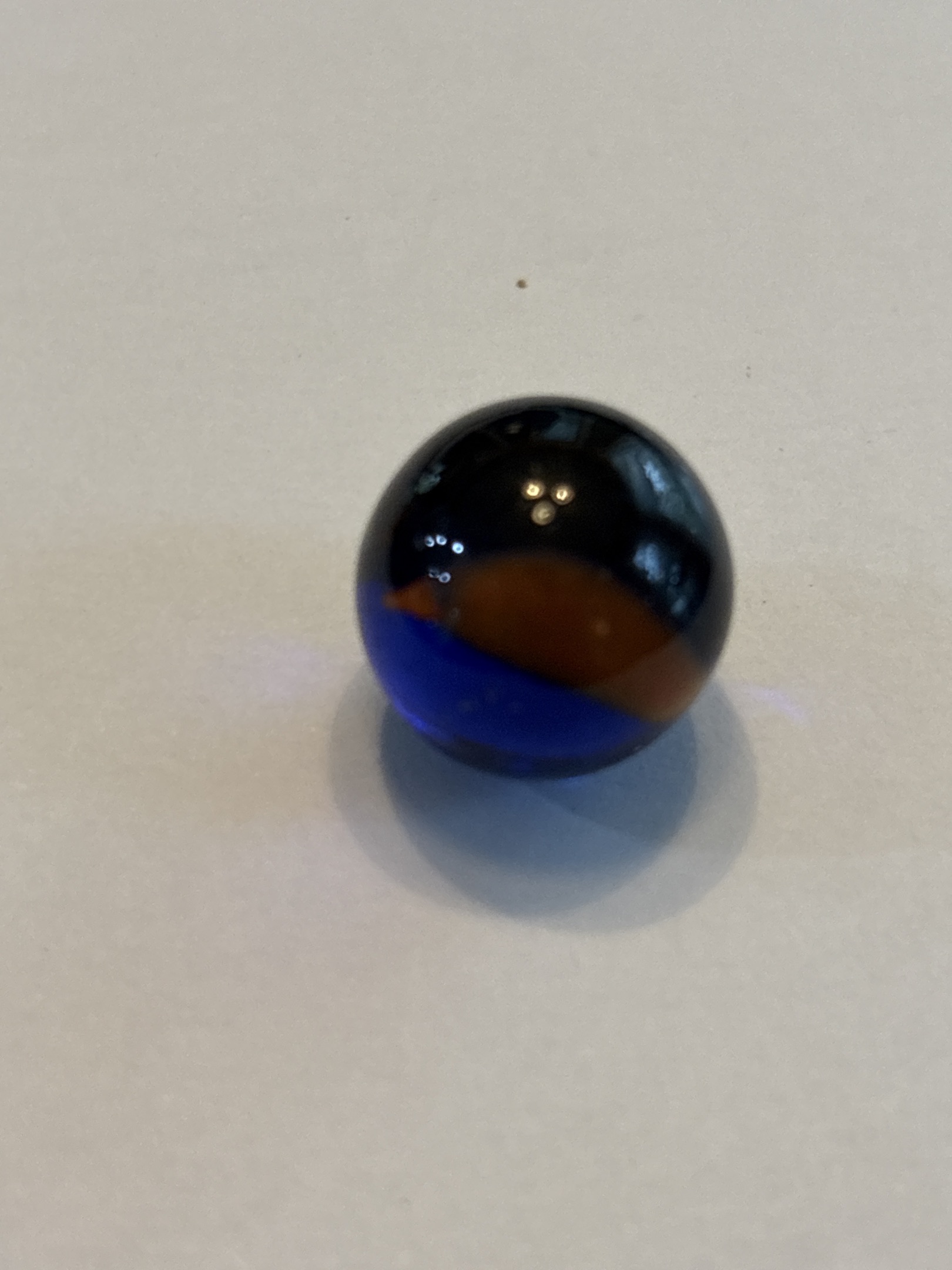 Cobalt Base Cat's Eye by Vitro Agate Company, identification view