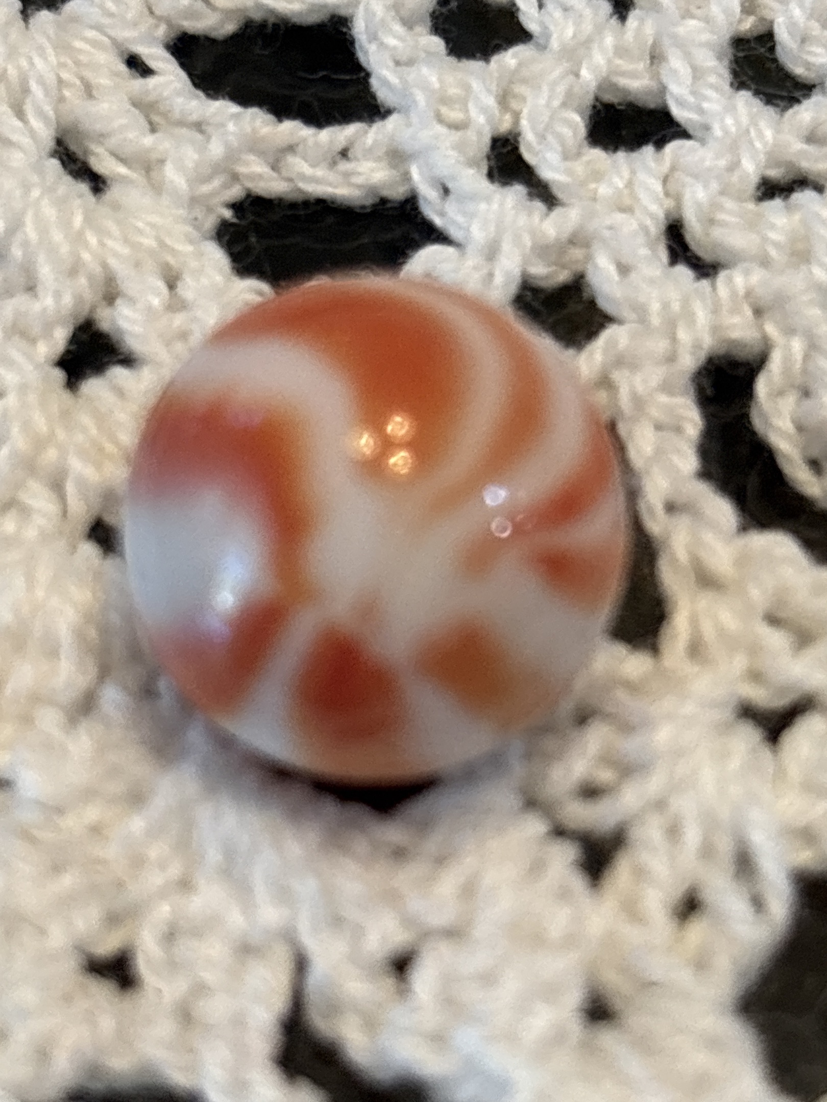 Orange and White Corkscrew by Akro Agate Company