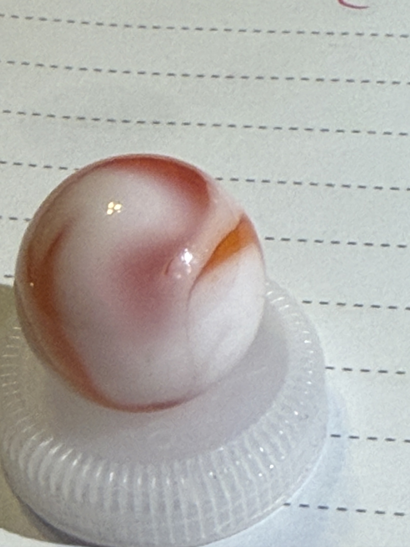 Orange and White Swirl by Akro Agate Company