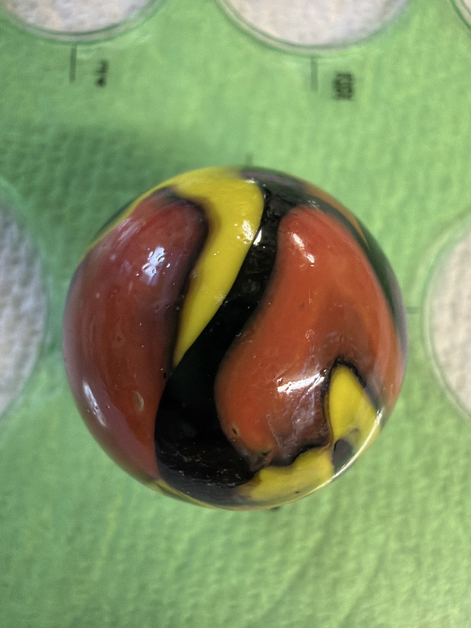 Black Bumblebee Special with Red and Yellow by Akro Agate, identification view