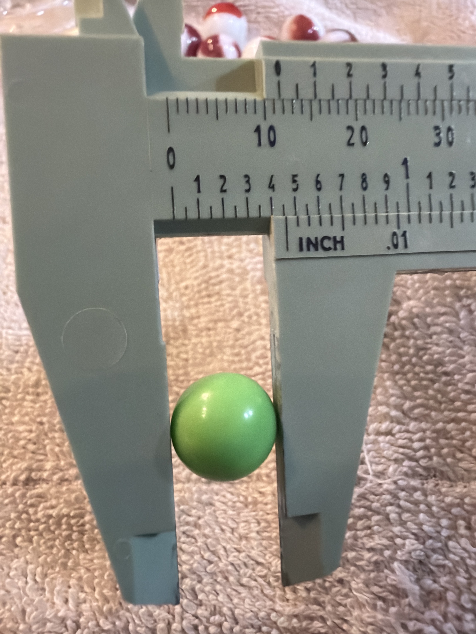 Green Solid Opaque Peewee Game Marble by Vitro Agate, identification view