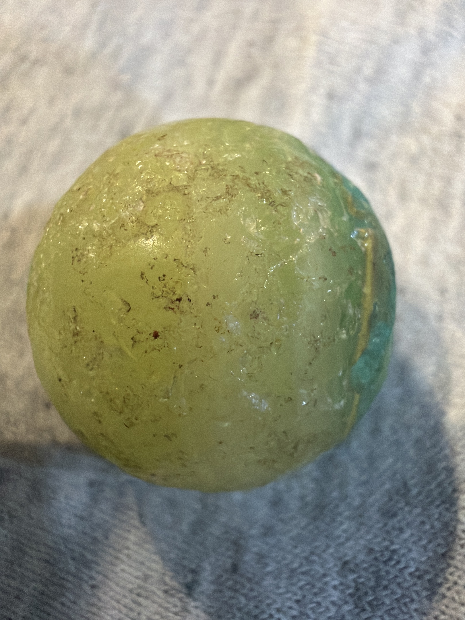 Yellow Slag Shooter by Akro Agate, identification view