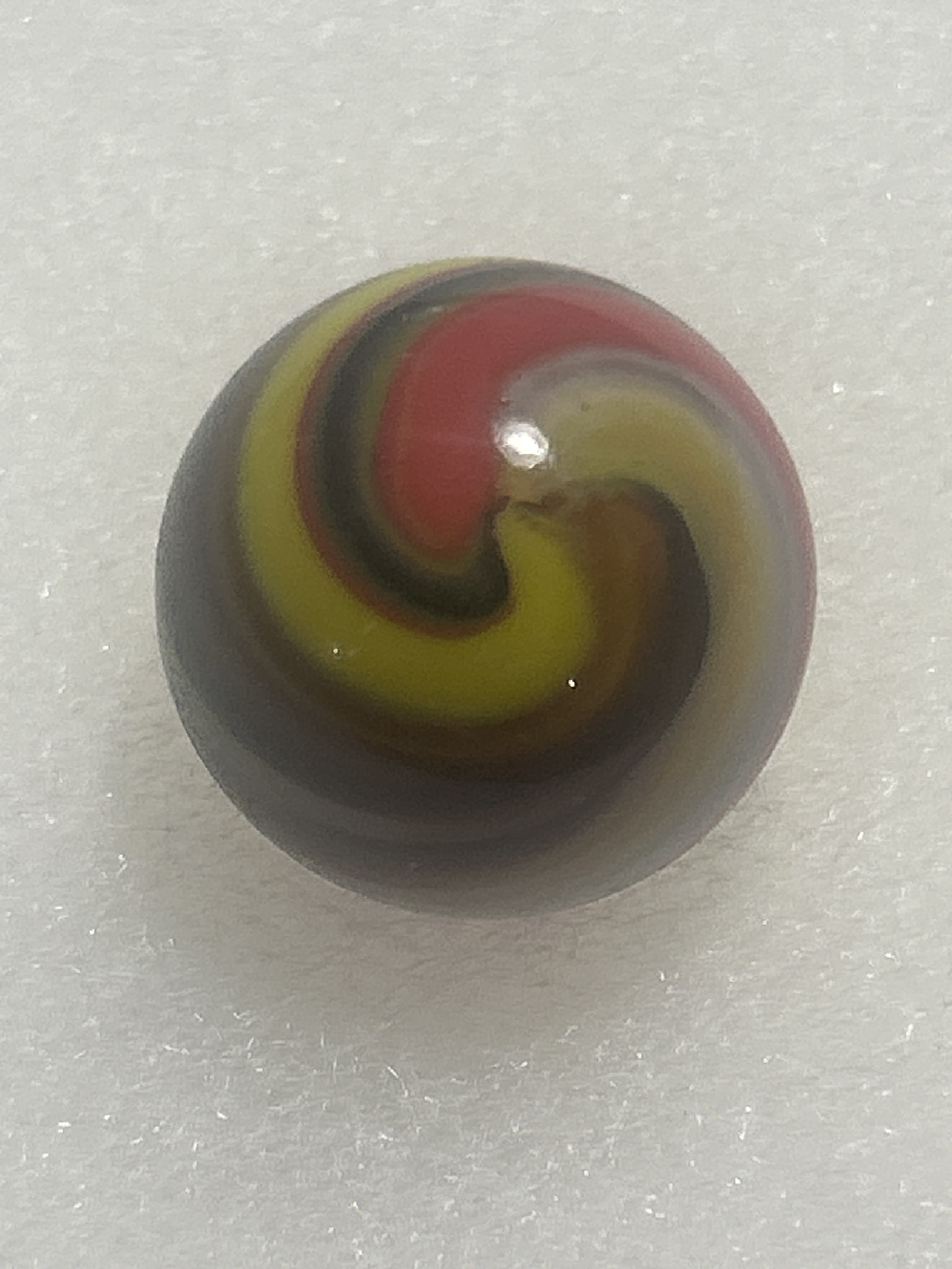 Tri-Color Swirl (Red, Yellow, Black) by Akro Agate Company