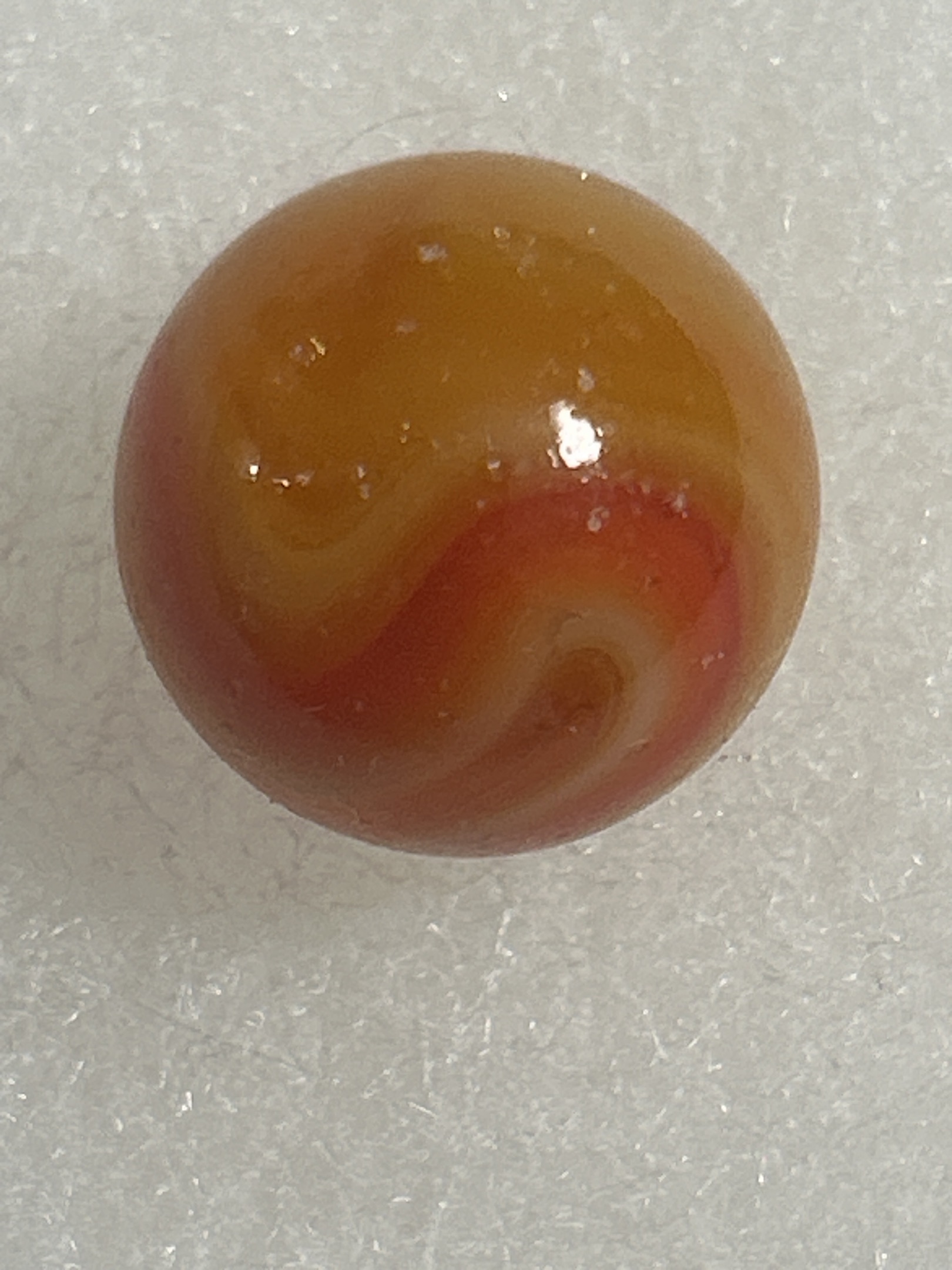 Red on Amber Slag by Akro Agate Company