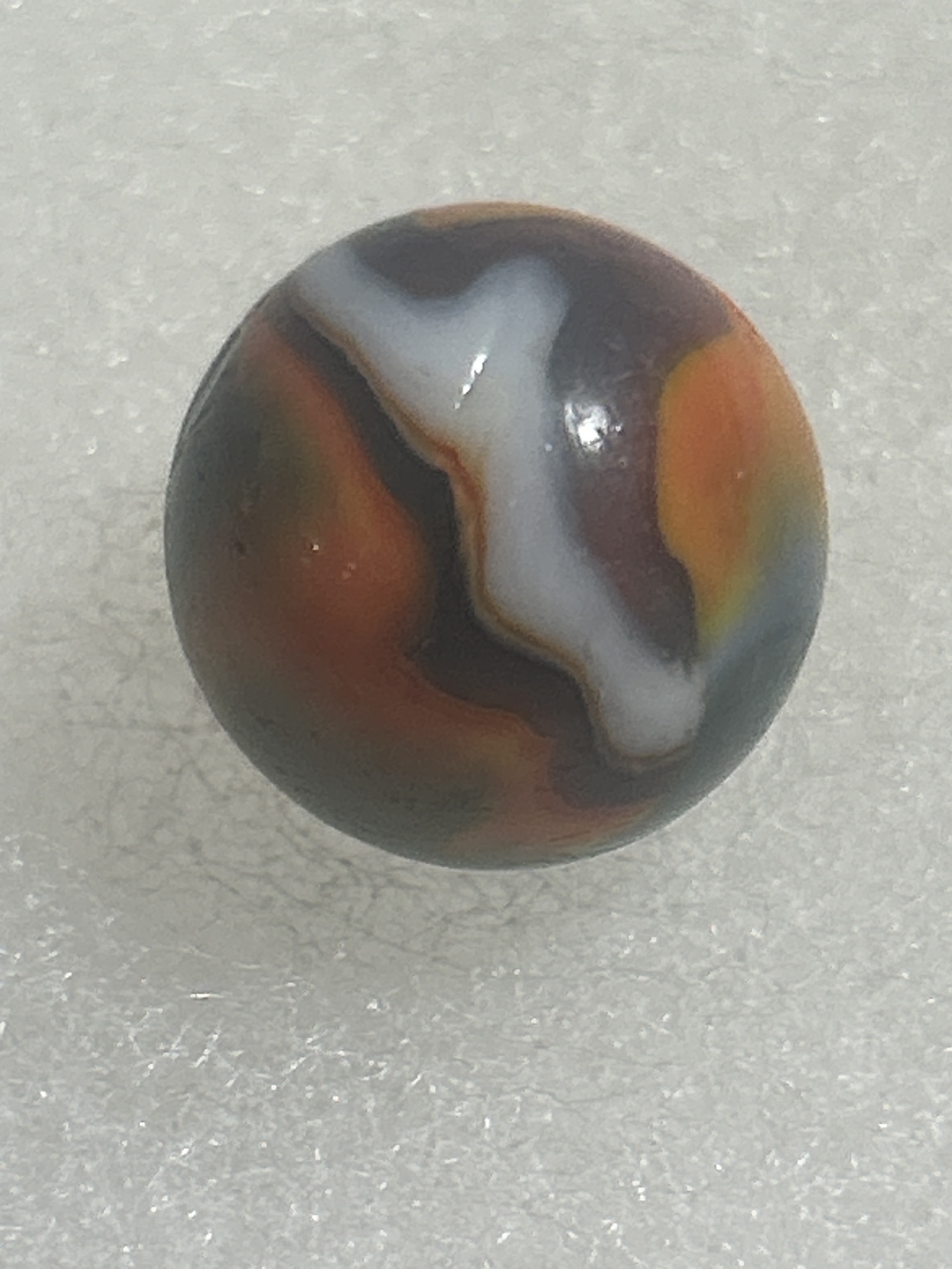 Tri-Color Swirl (Blue, Orange, White) by Akro Agate Company