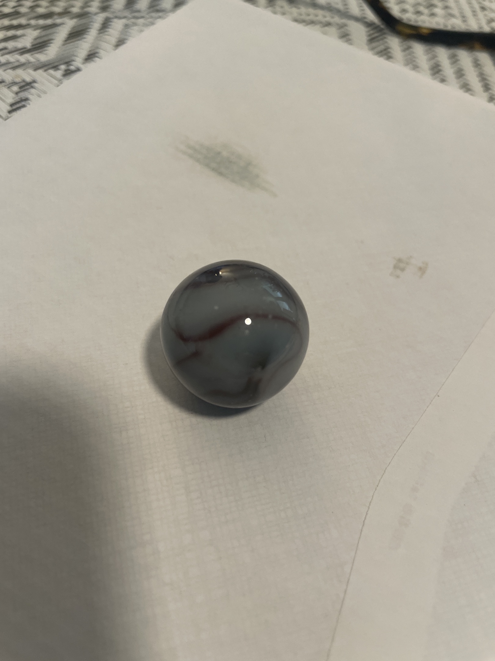 Smoky Oxblood Swirl by Akro Agate Company