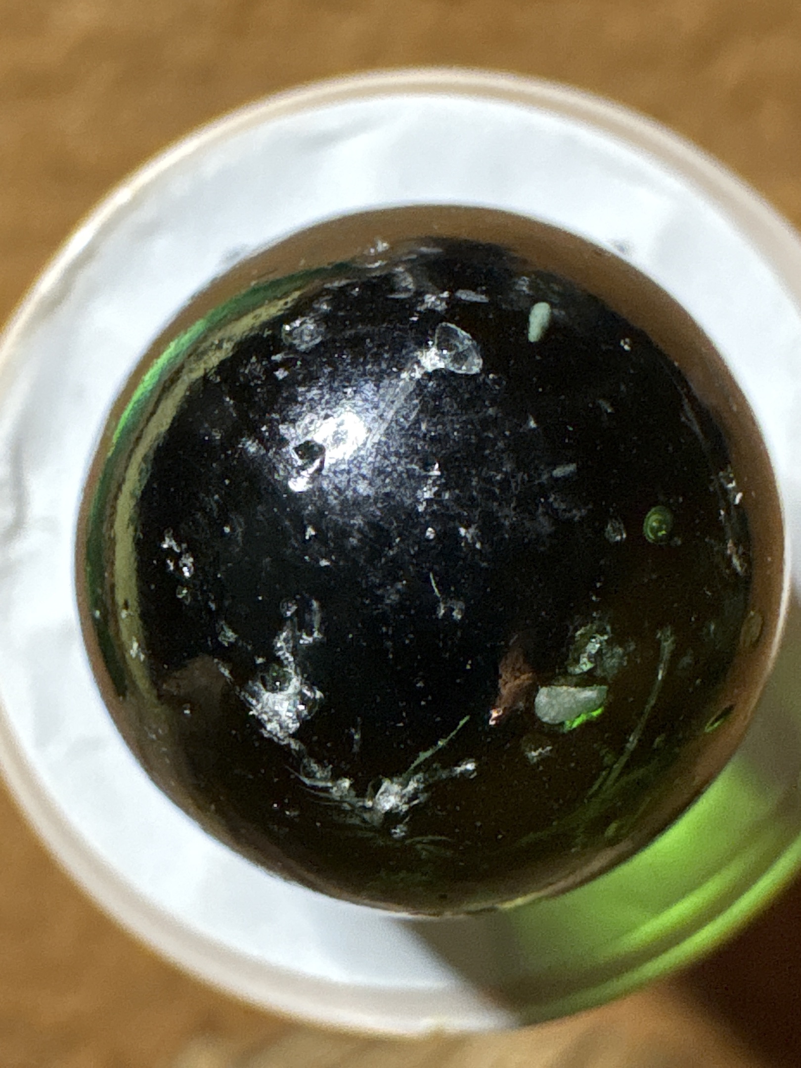 Black Slag (Green Base) by Akro Agate Company