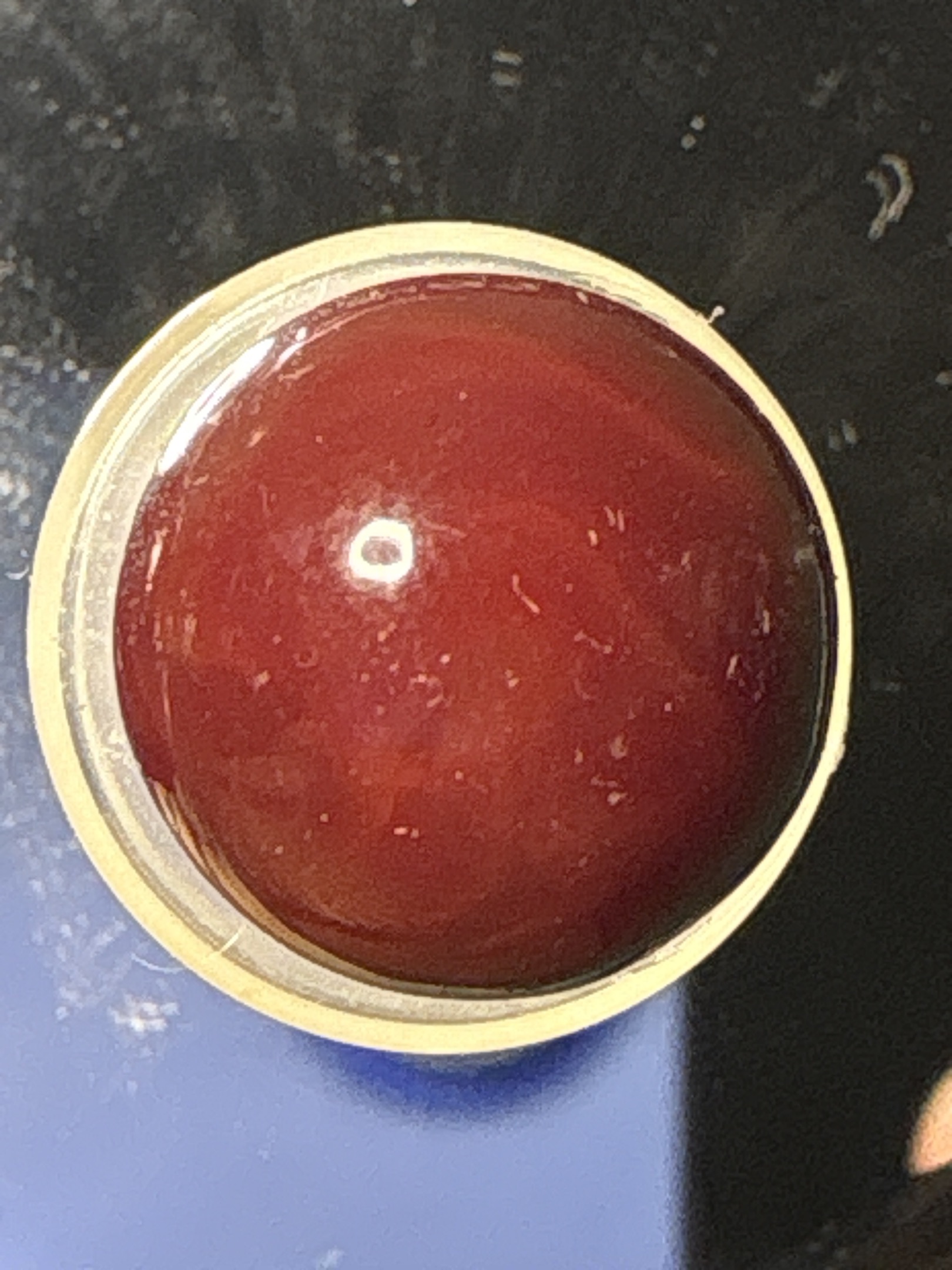 Solid Red Game Marble by Akro Agate Company, identification view