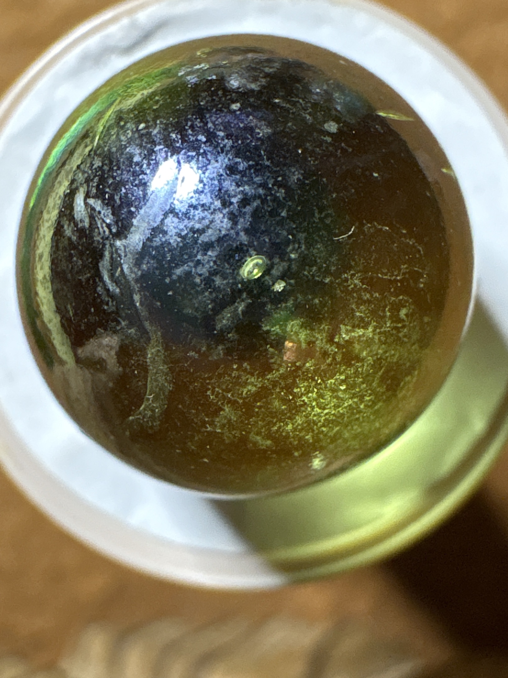 Iridescent Blackie by Vitro Agate Company, identification view