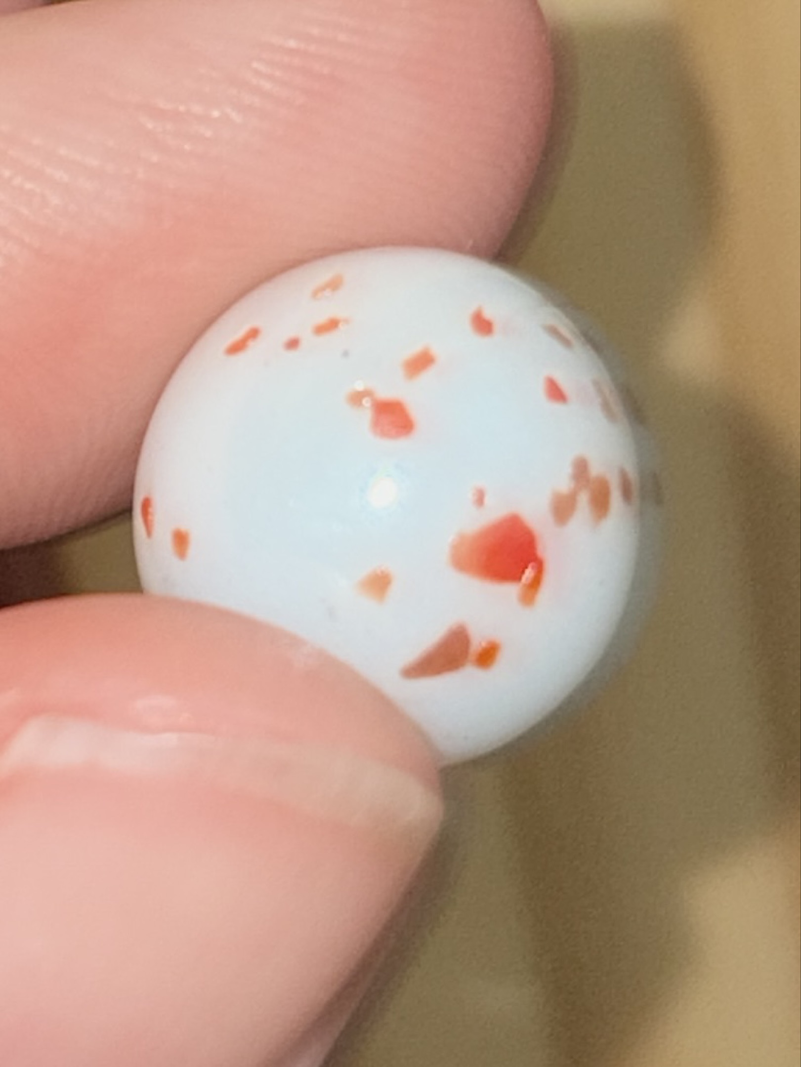 White with Orange-Red Confetti by Vitro Agate, identification view