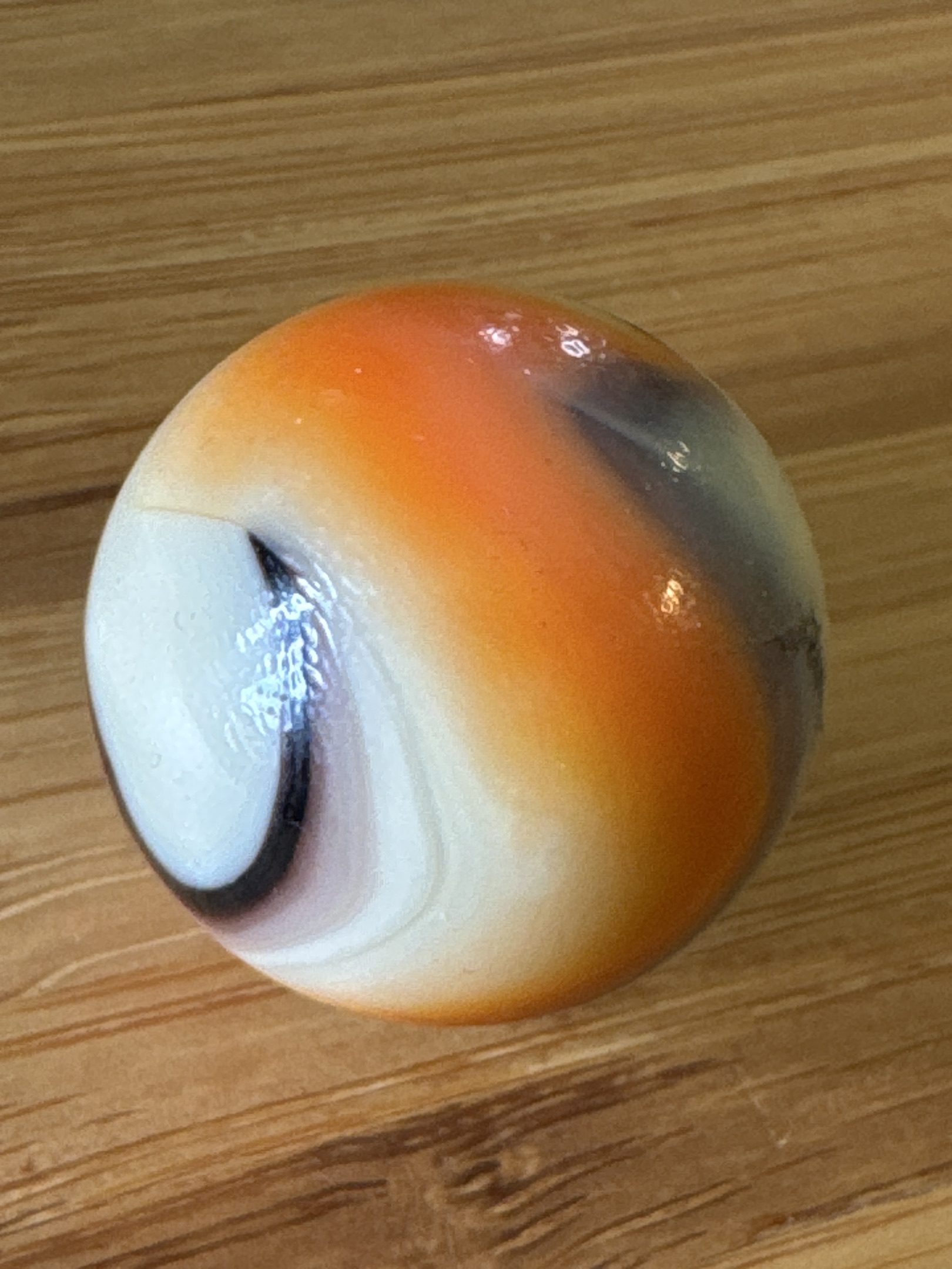 Orange, White, and Brown Swirl by Christensen Agate Company, identification view