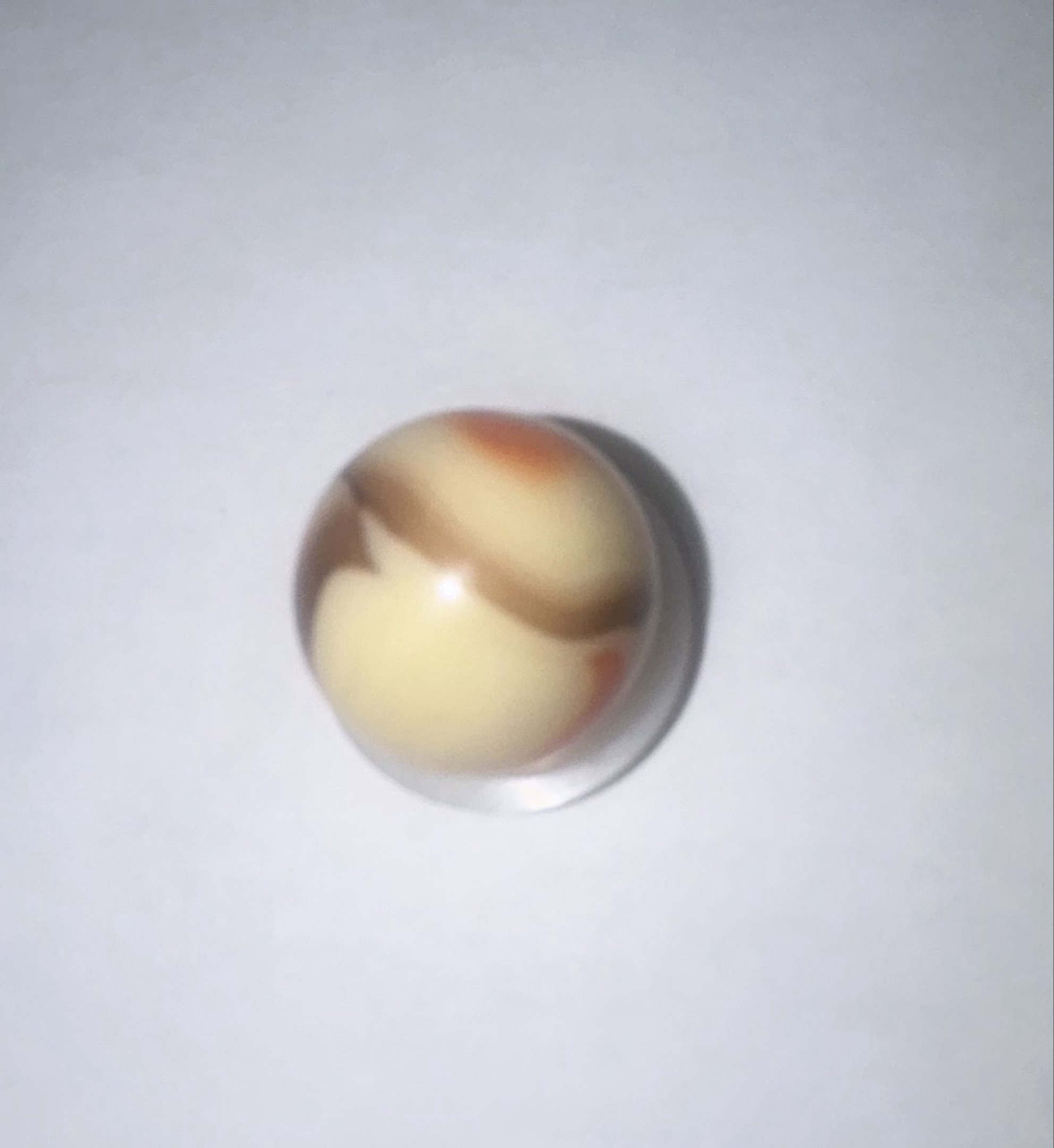 Orange and Brown Swirl by Akro Agate Company