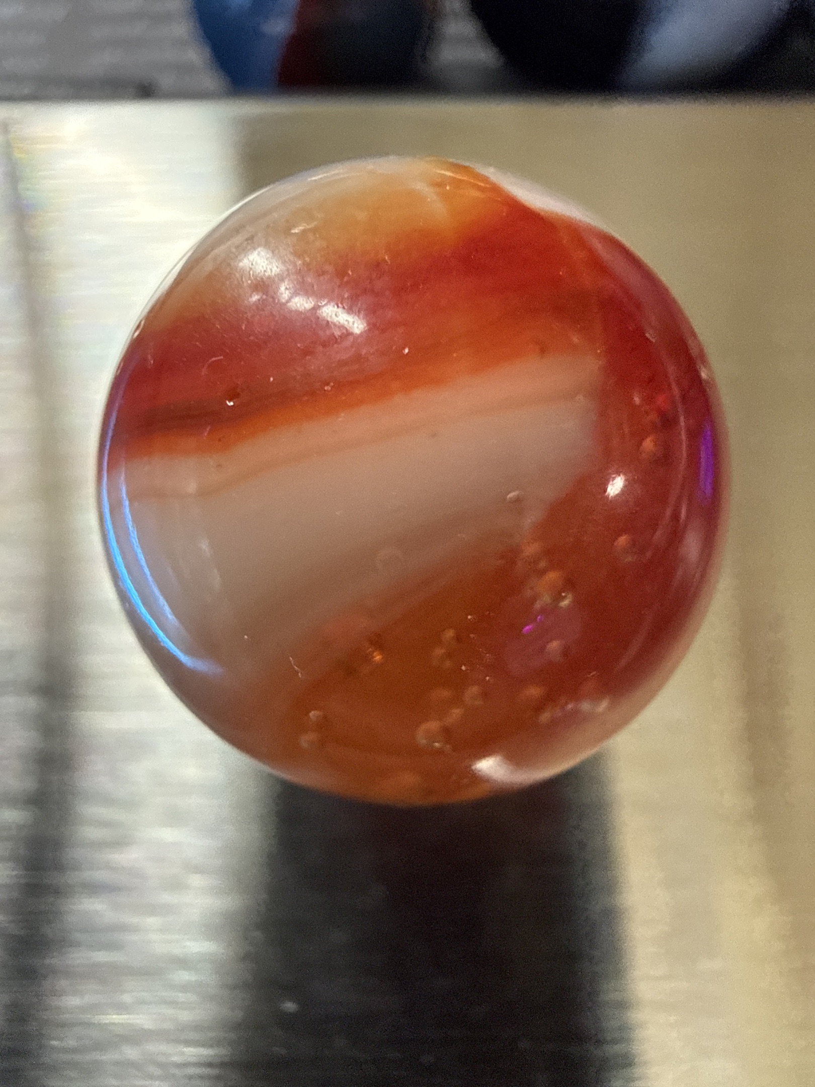Red Popeye on Amber by Akro Agate Company